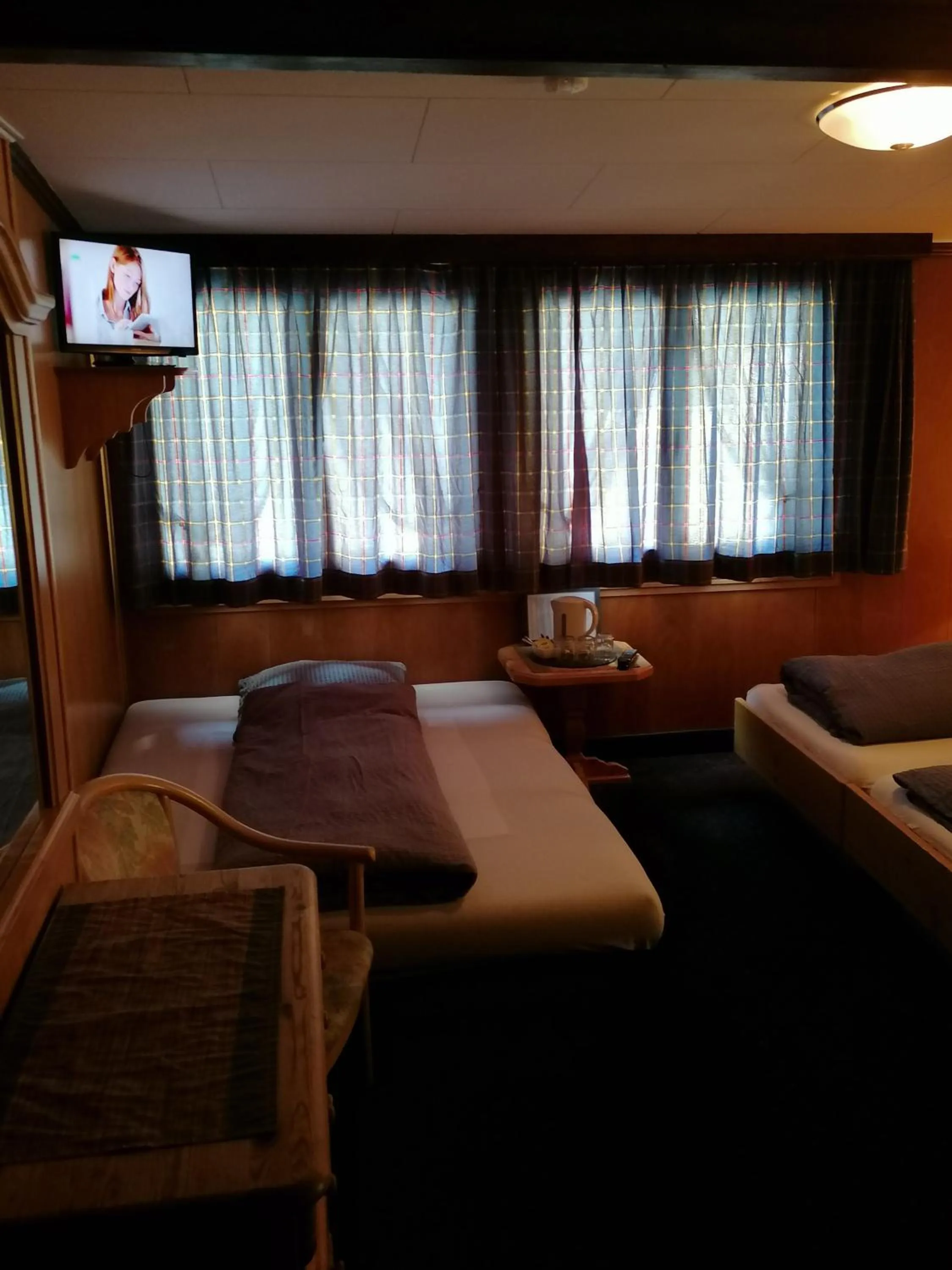 Photo of the whole room, Bed in Petit Helvetia Budget Hotel