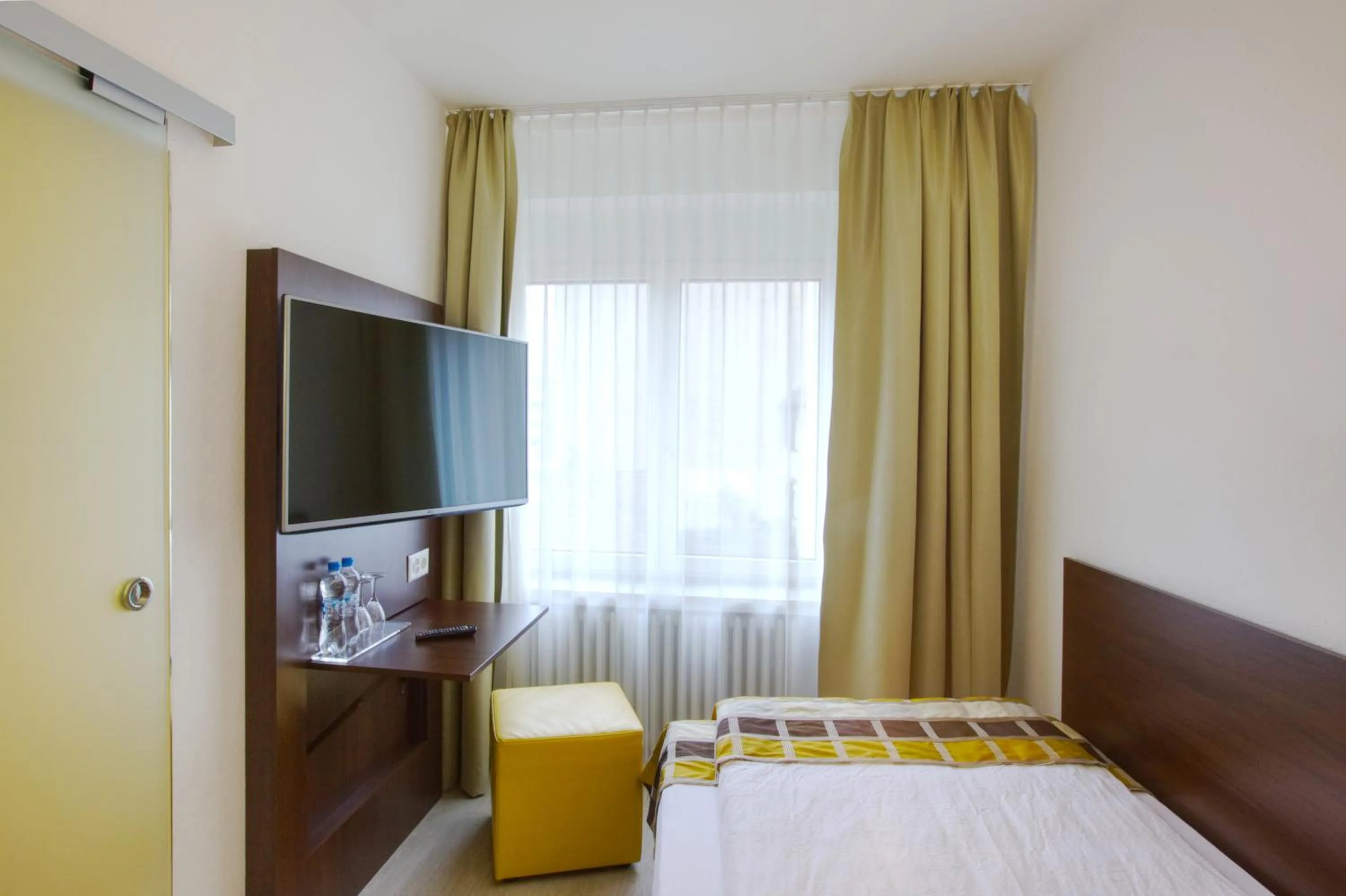 Bed in Hotel Rheinfelderhof