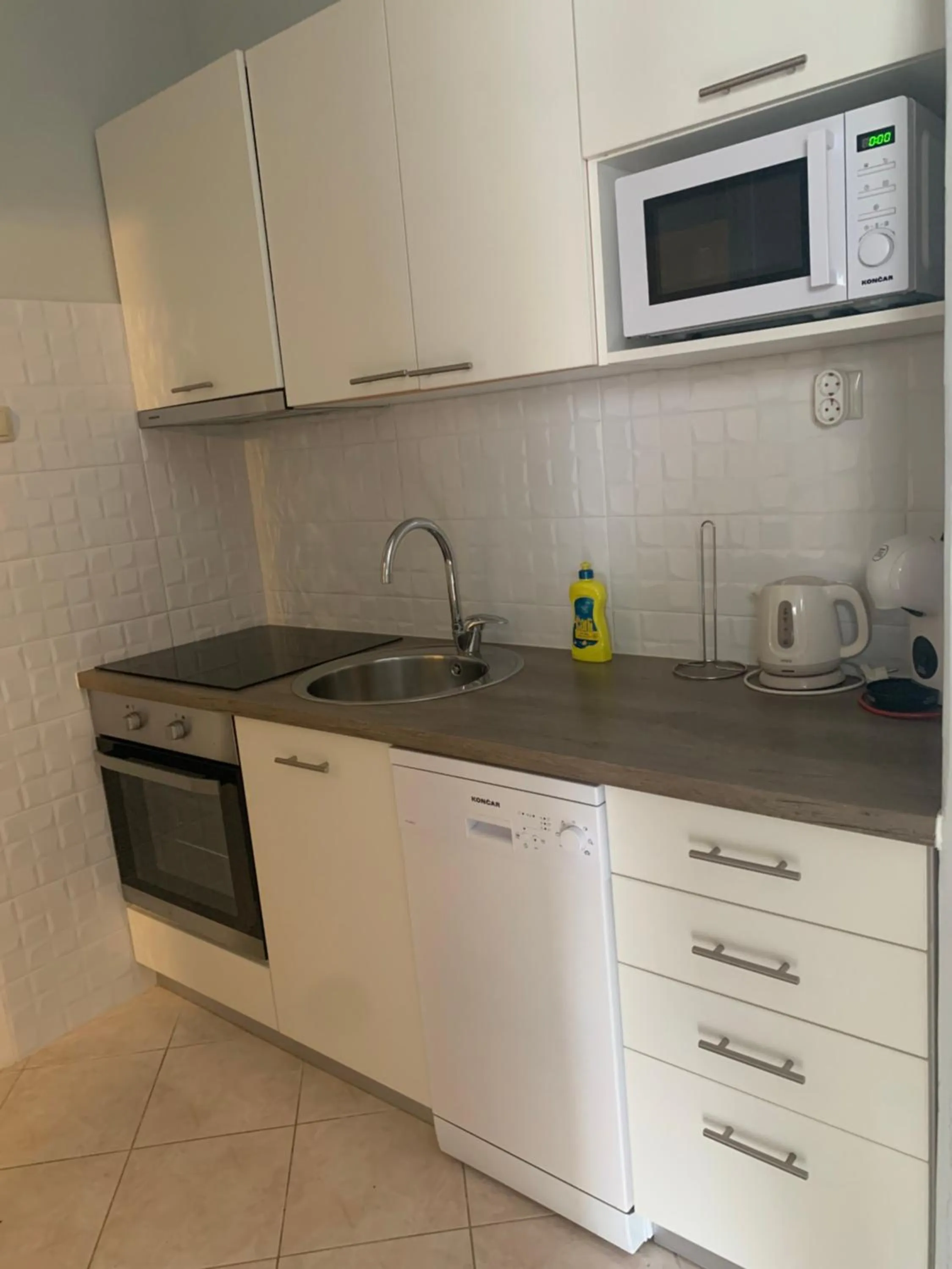 kitchen in Lumbarda Resort Apartments
