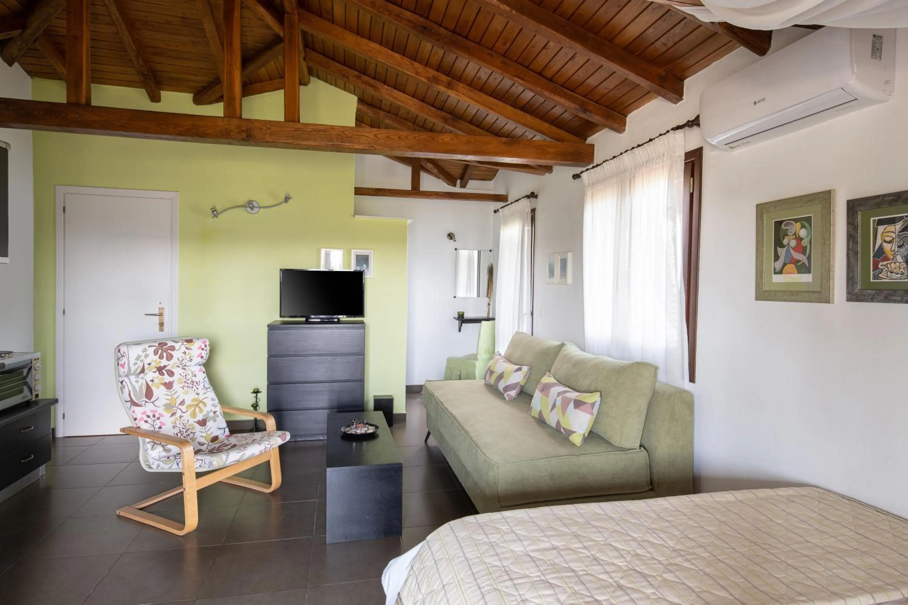 Bedroom in Heos Accommodation