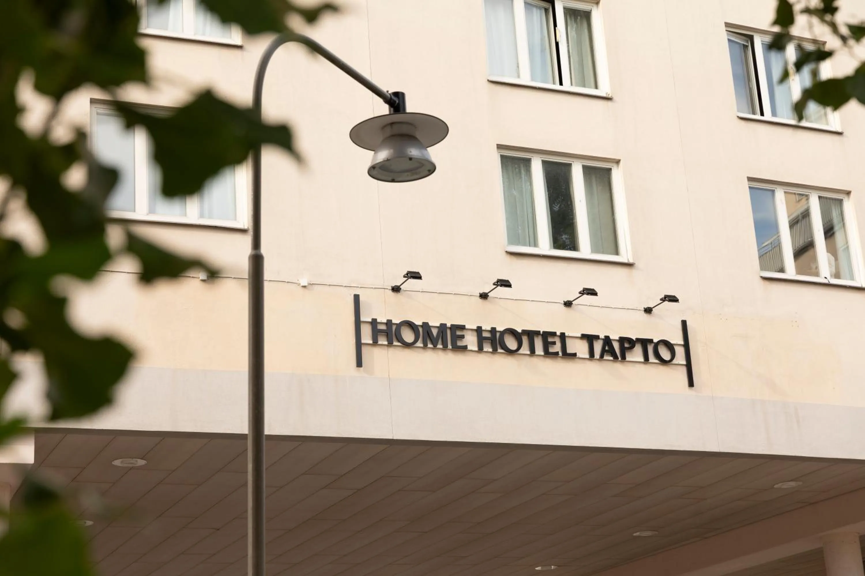 Property building in Home Hotel Tapto