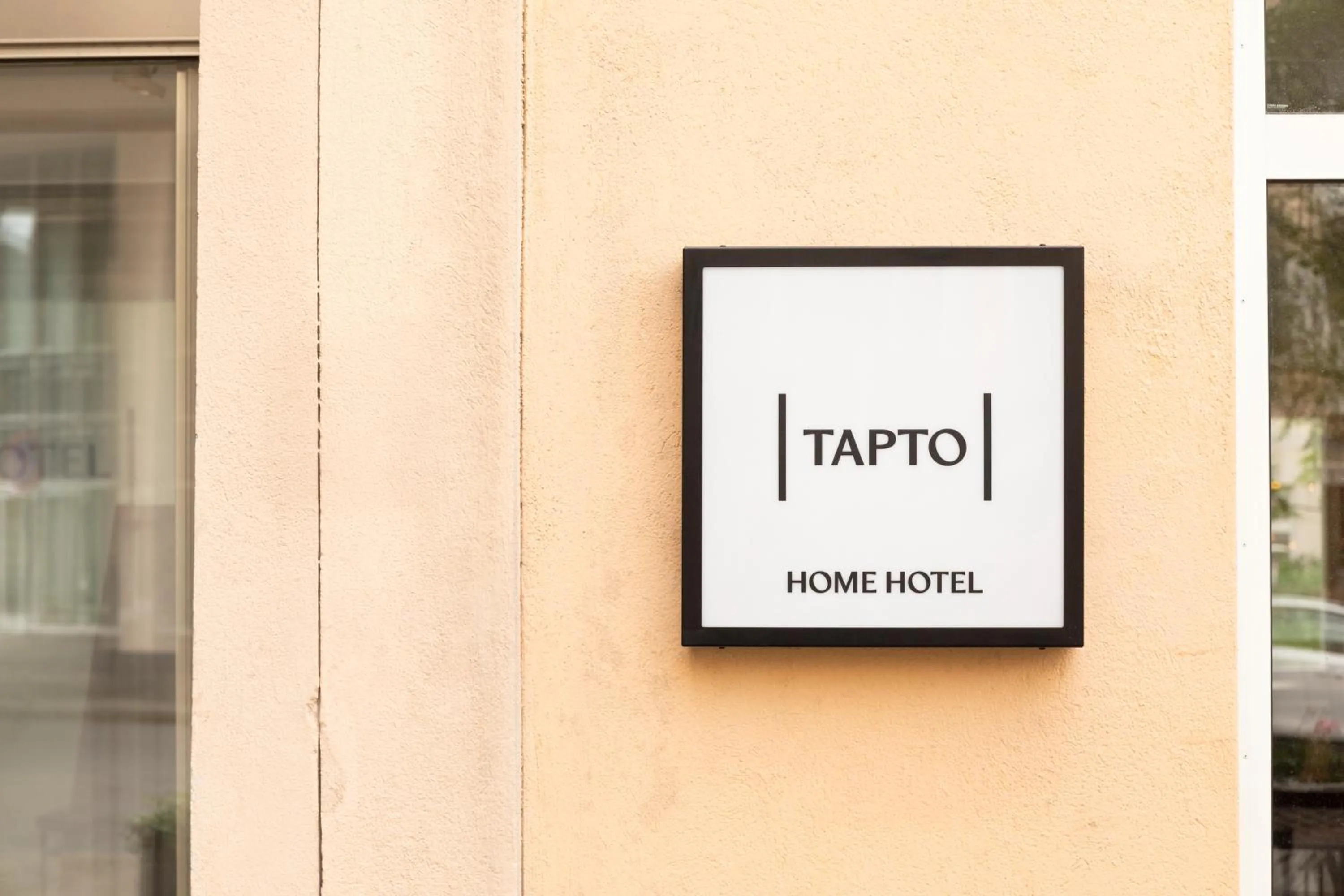 Property building in Home Hotel Tapto