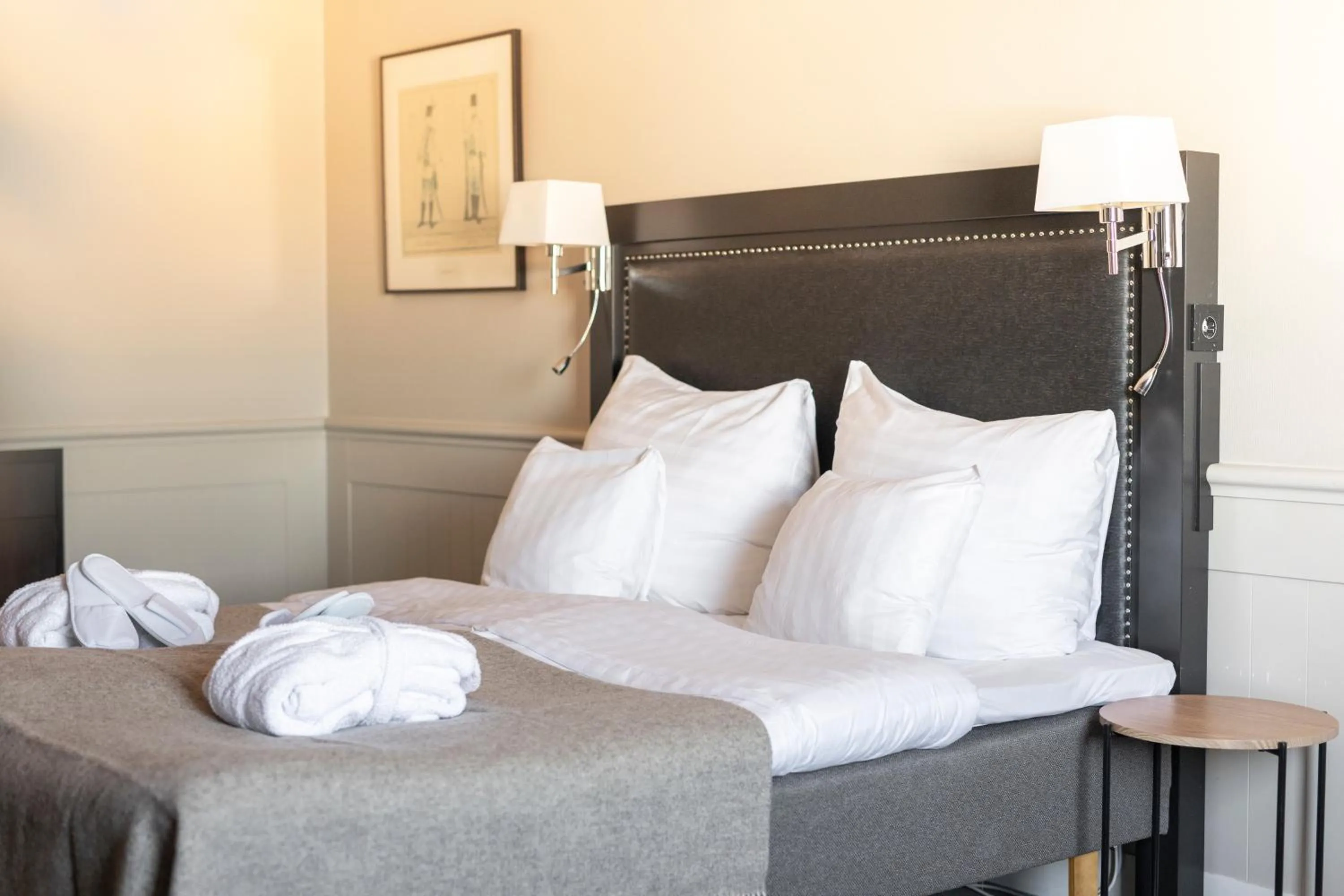 Bed in Home Hotel Tapto