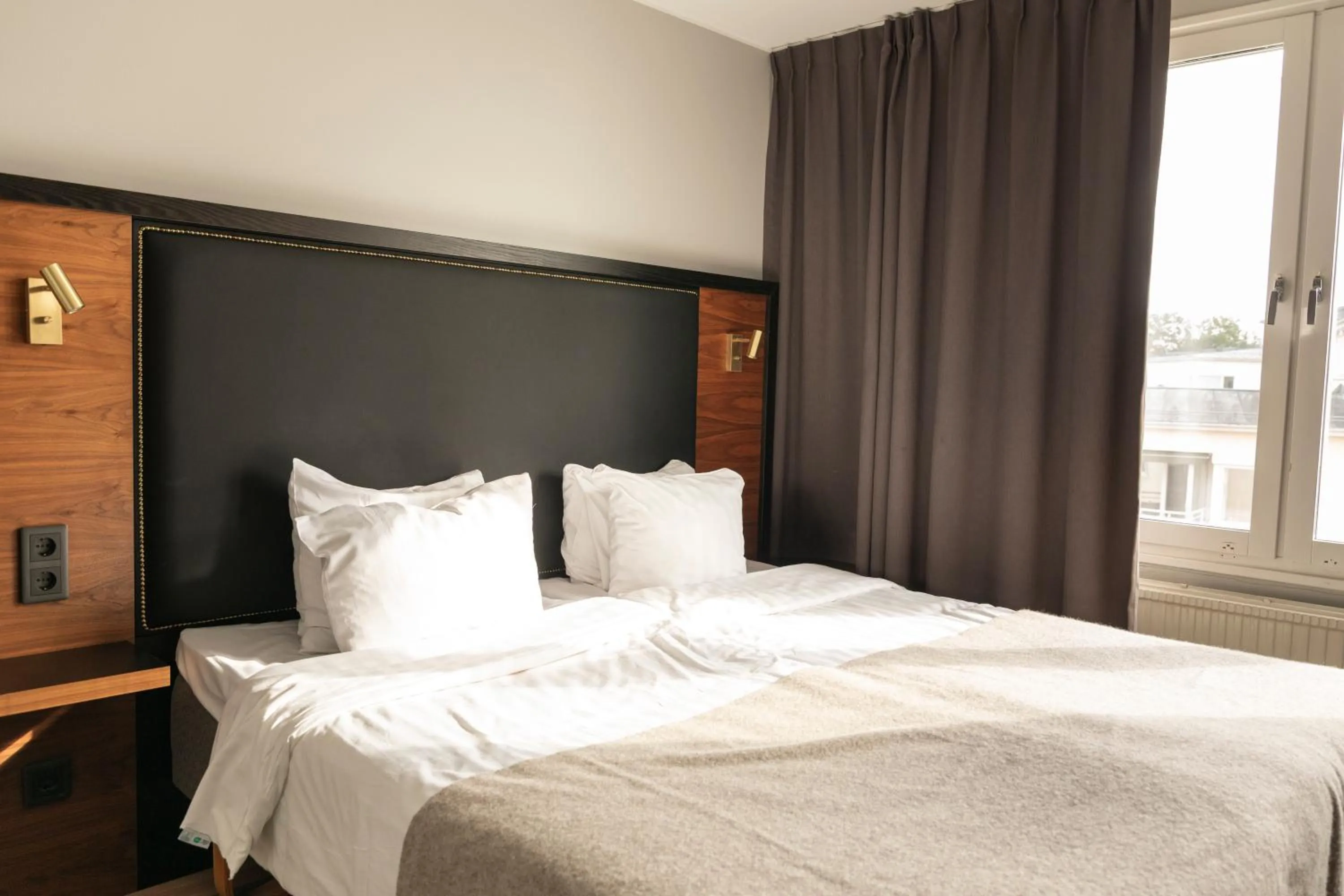 Bed in Home Hotel Tapto