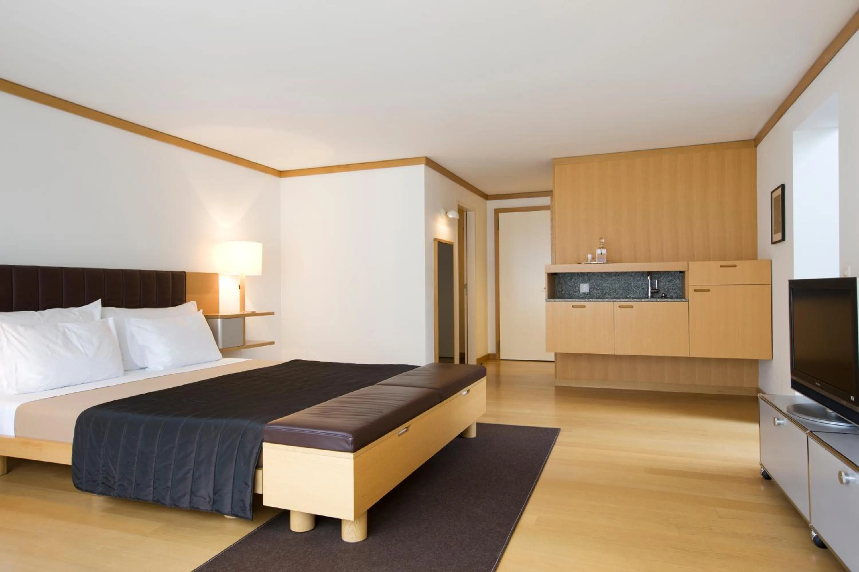 Photo of the whole room, Bed in The Omnia