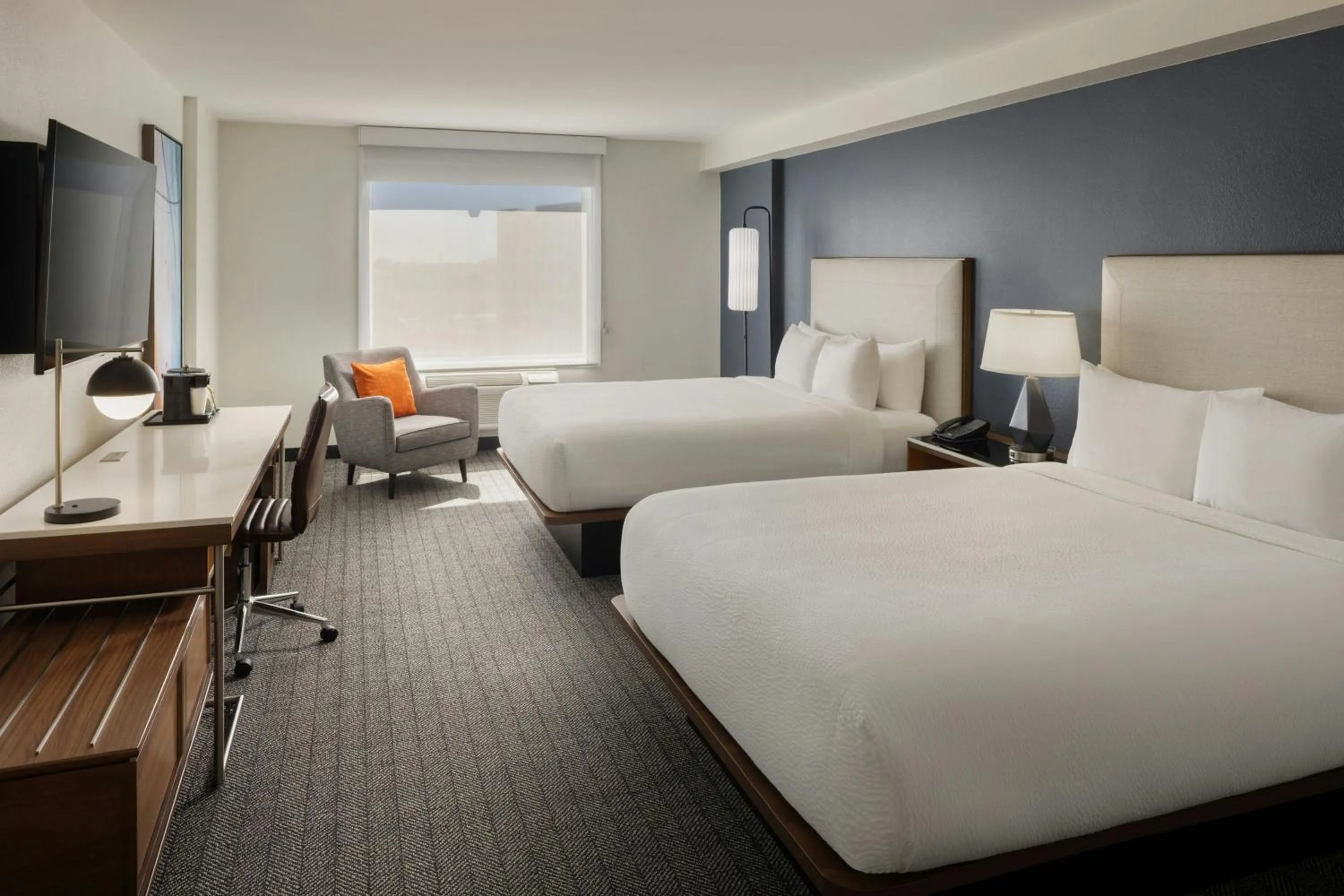 Photo of the whole room, Bed in Courtyard by Marriott across Universal Orlando