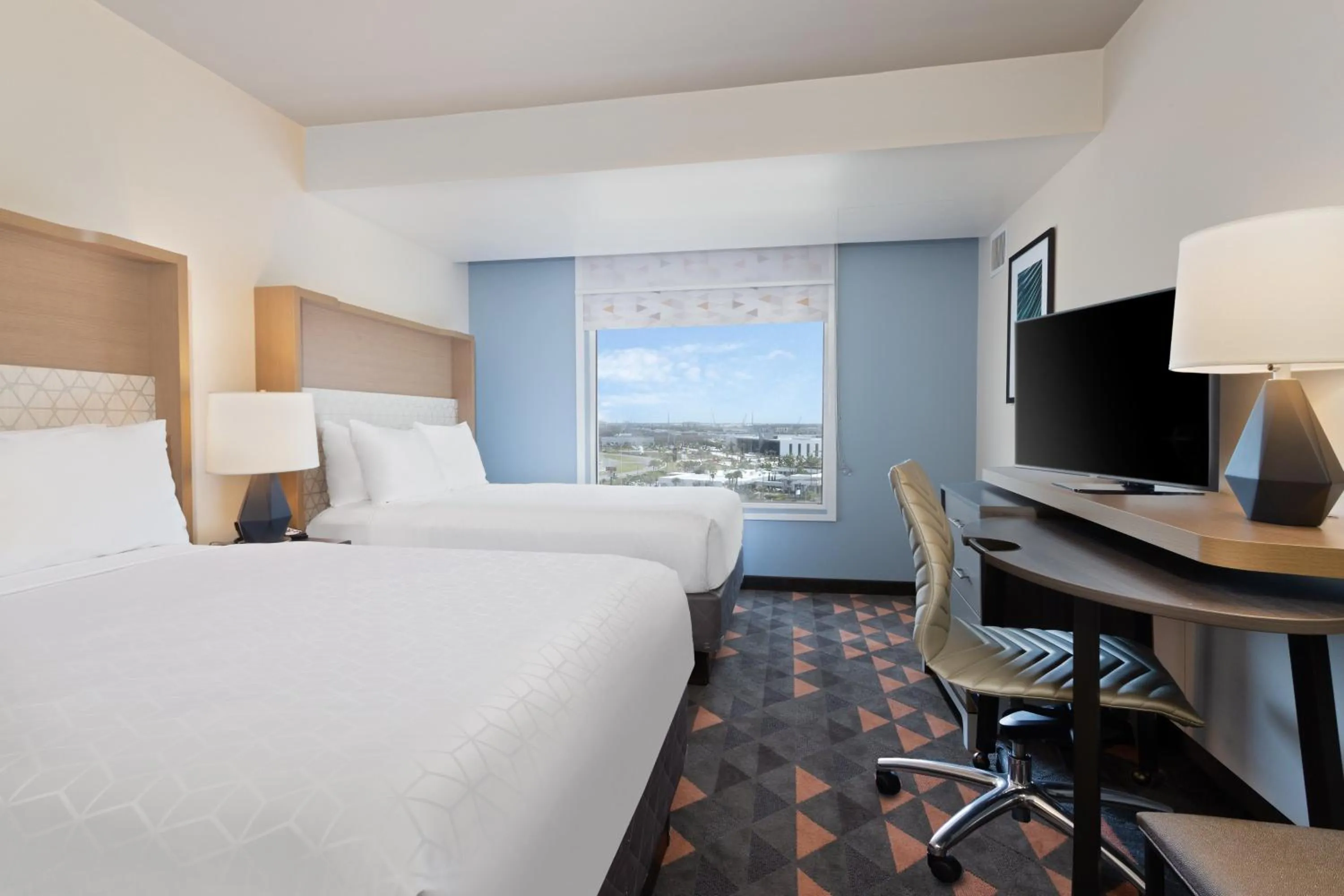 Photo of the whole room, Bed in Holiday Inn & Suites Across from Universal Orlando by IHG