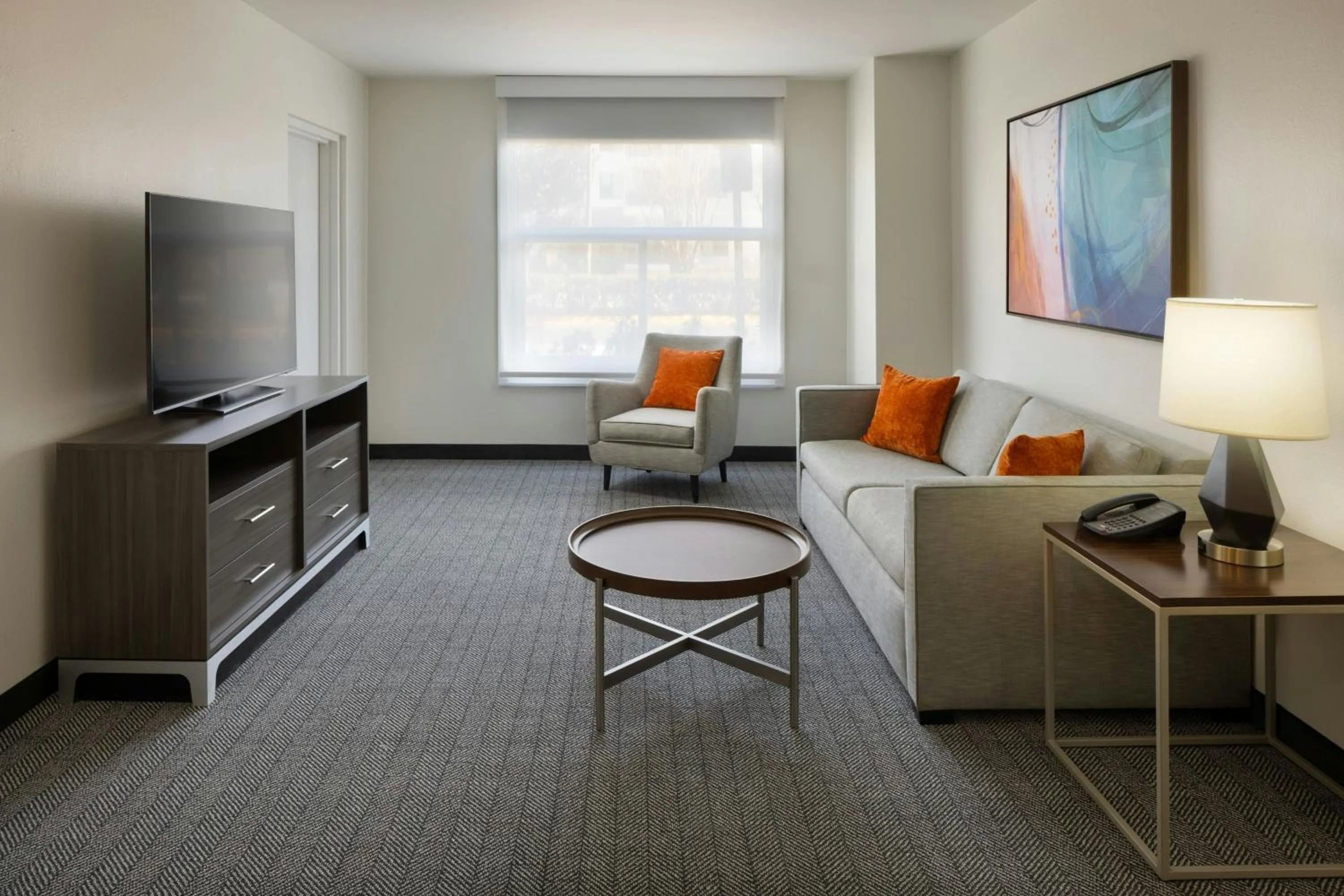 Living room in Courtyard by Marriott across Universal Orlando