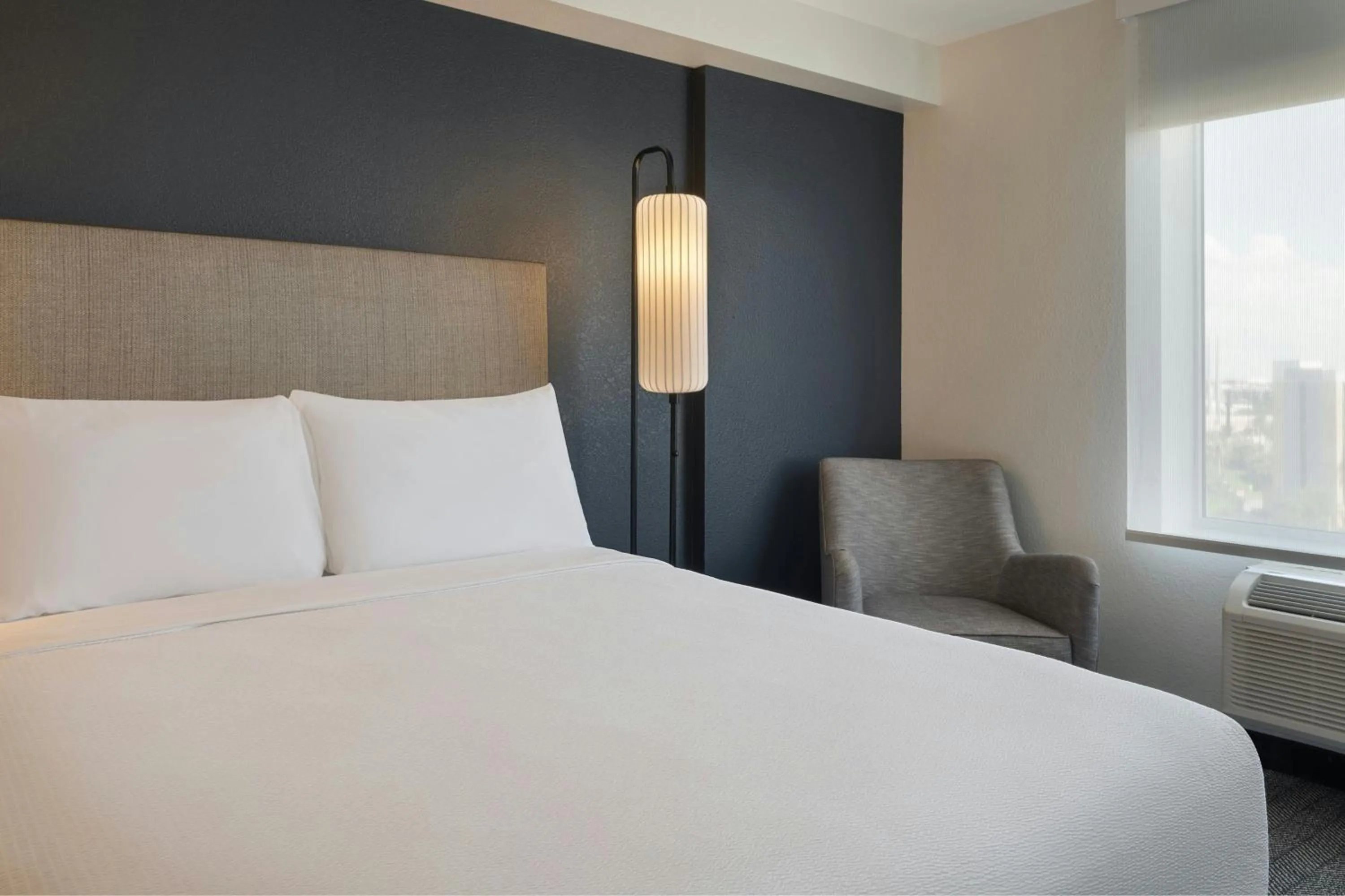 Photo of the whole room, Bed in Courtyard by Marriott across Universal Orlando