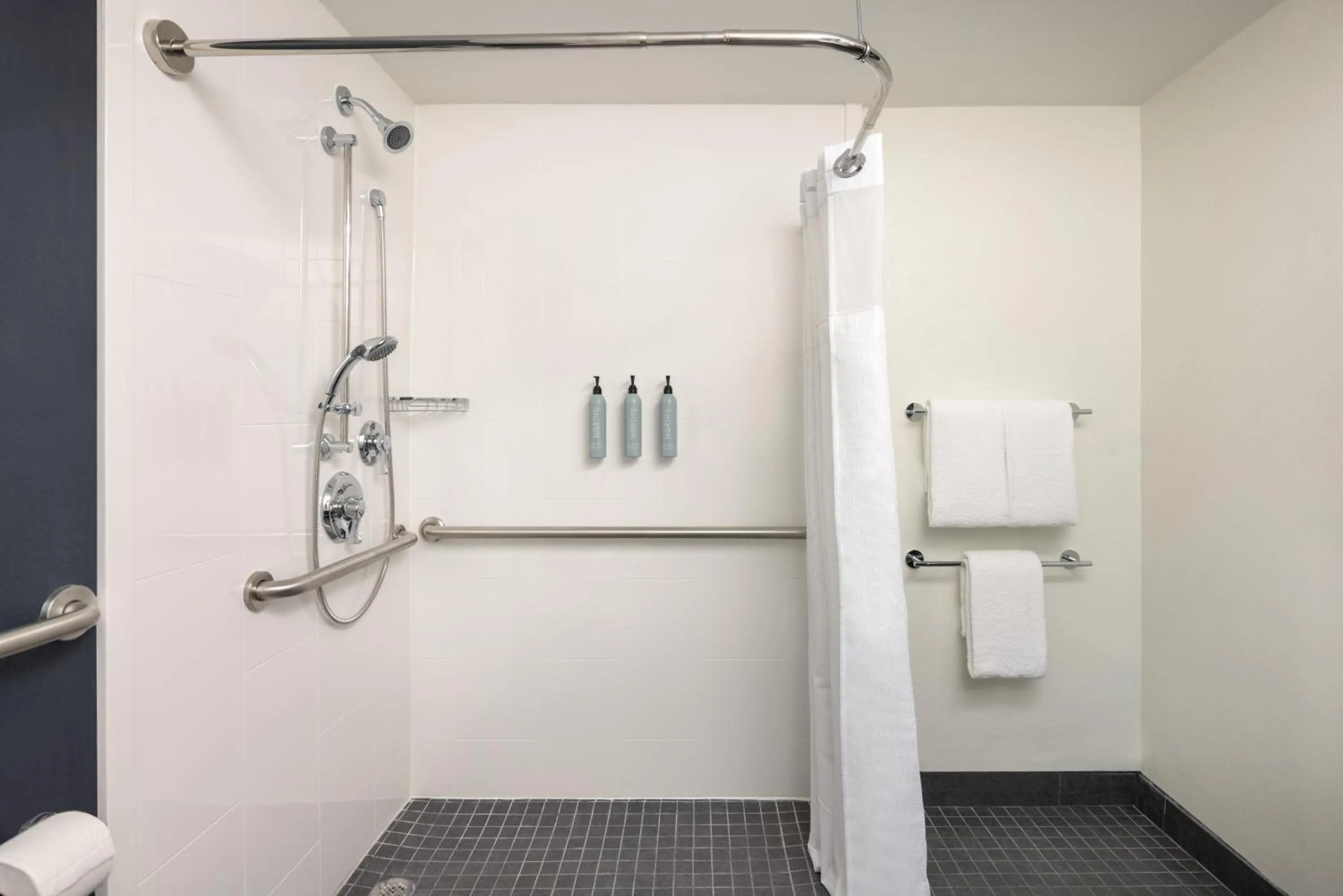 Bathroom in Courtyard by Marriott across Universal Orlando