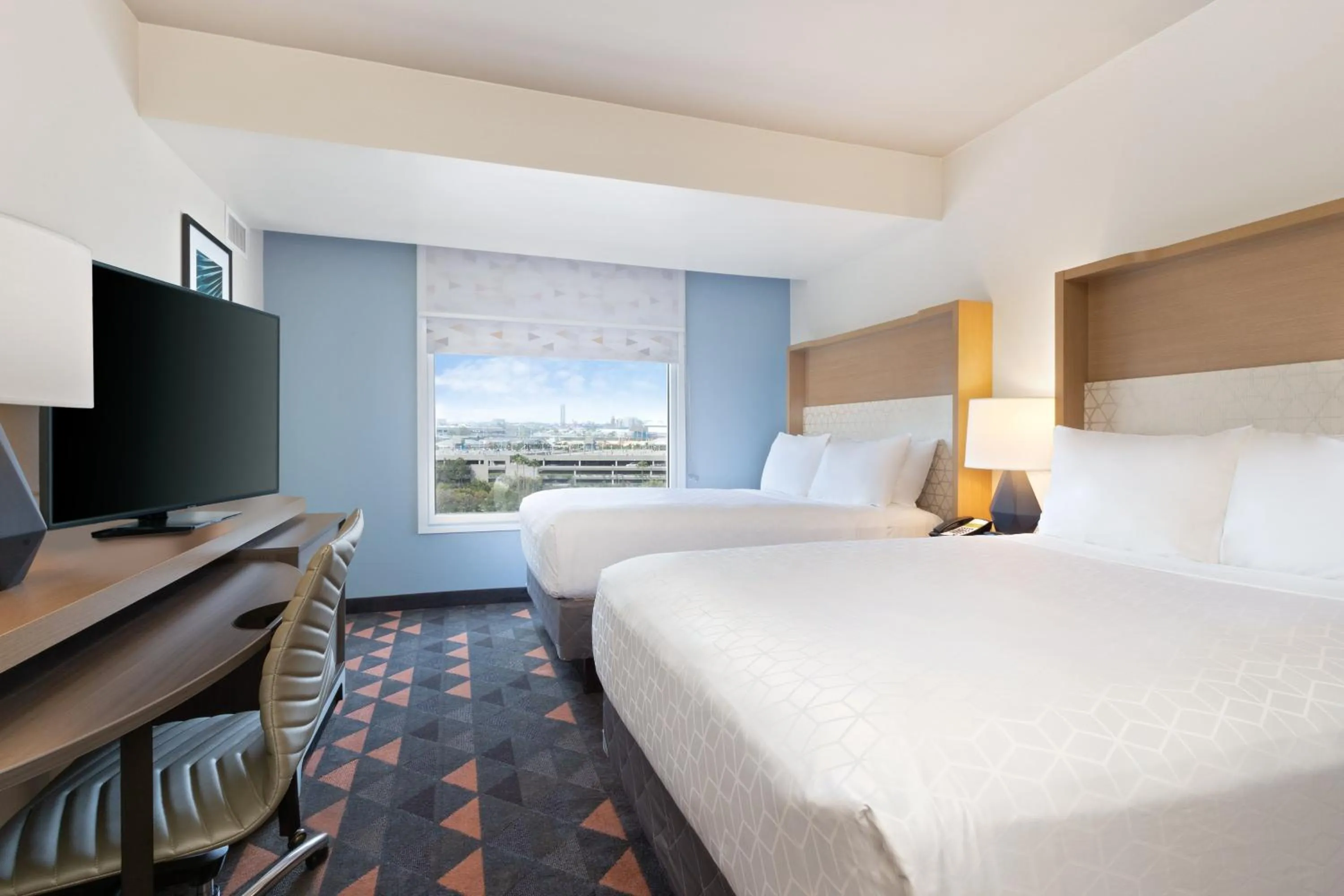 Photo of the whole room, Bed in Holiday Inn & Suites Across from Universal Orlando by IHG