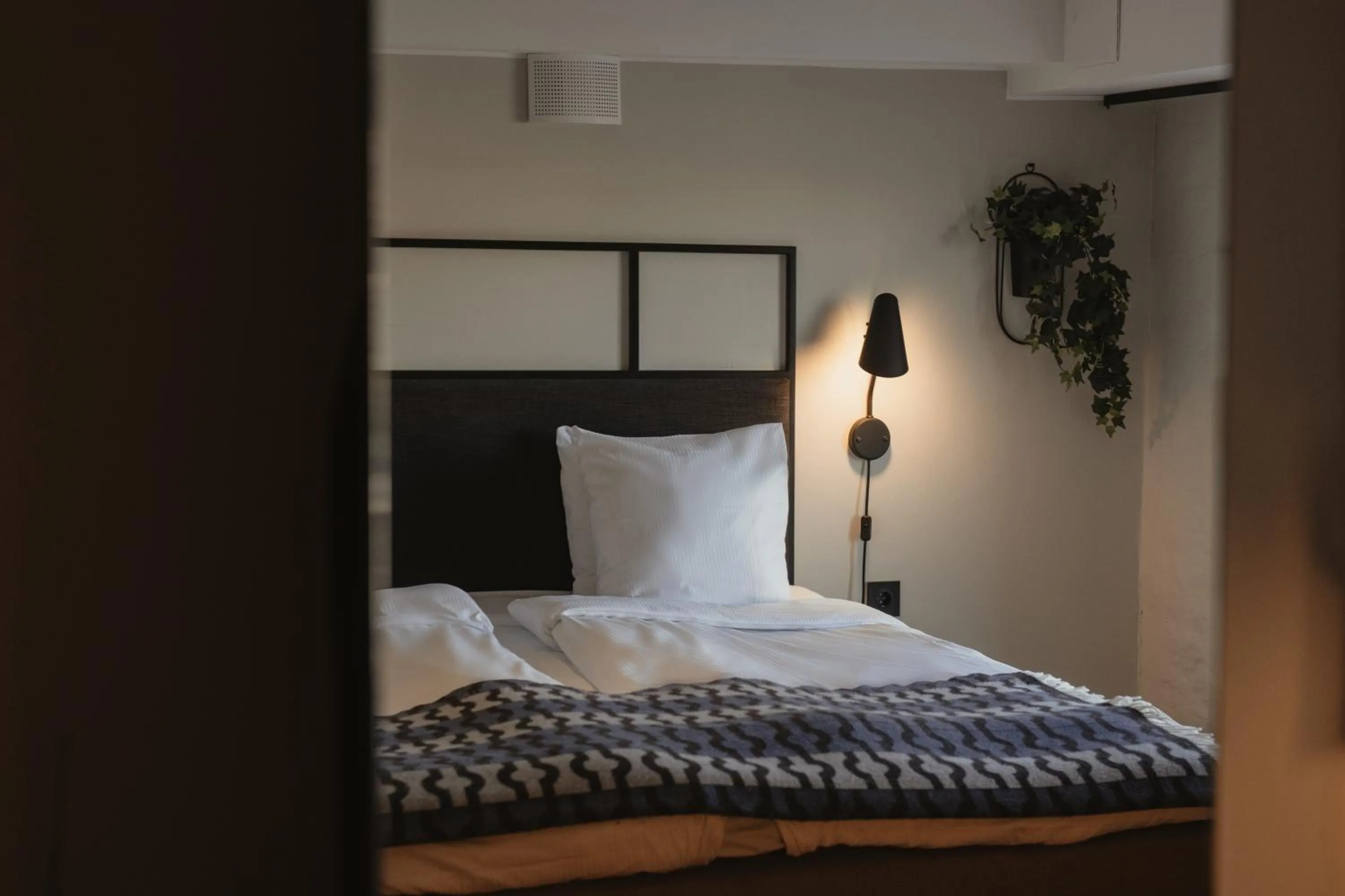 Bed in Home Hotel Packhuset