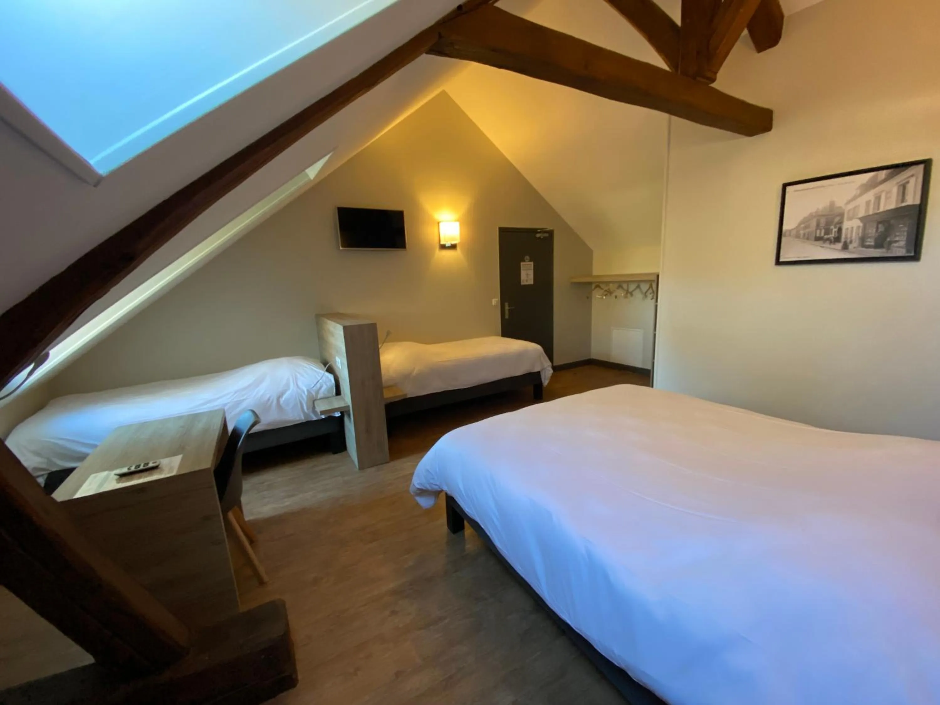 Photo of the whole room, Bed in LOGIS - Hôtel & Restaurant Saint Nicolas