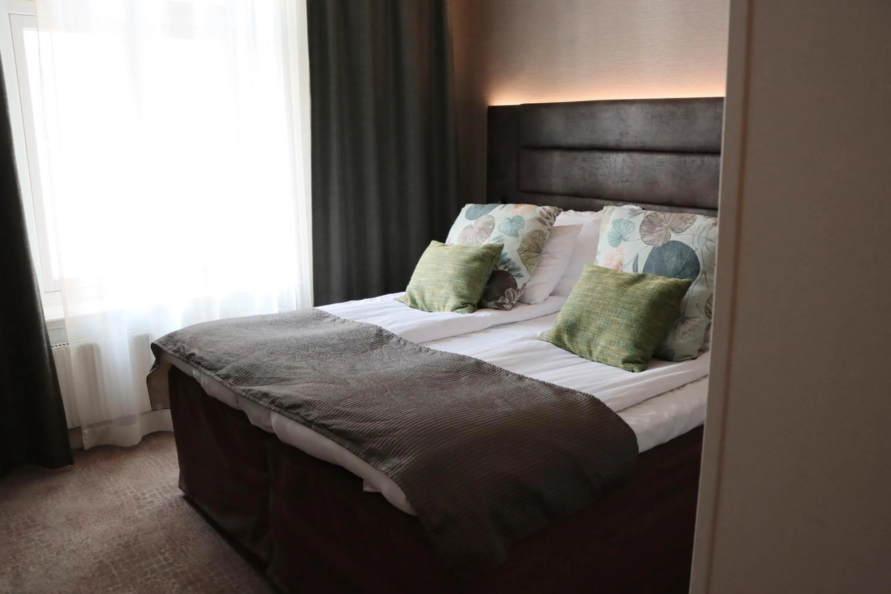 Bed in Home Hotel Victoria