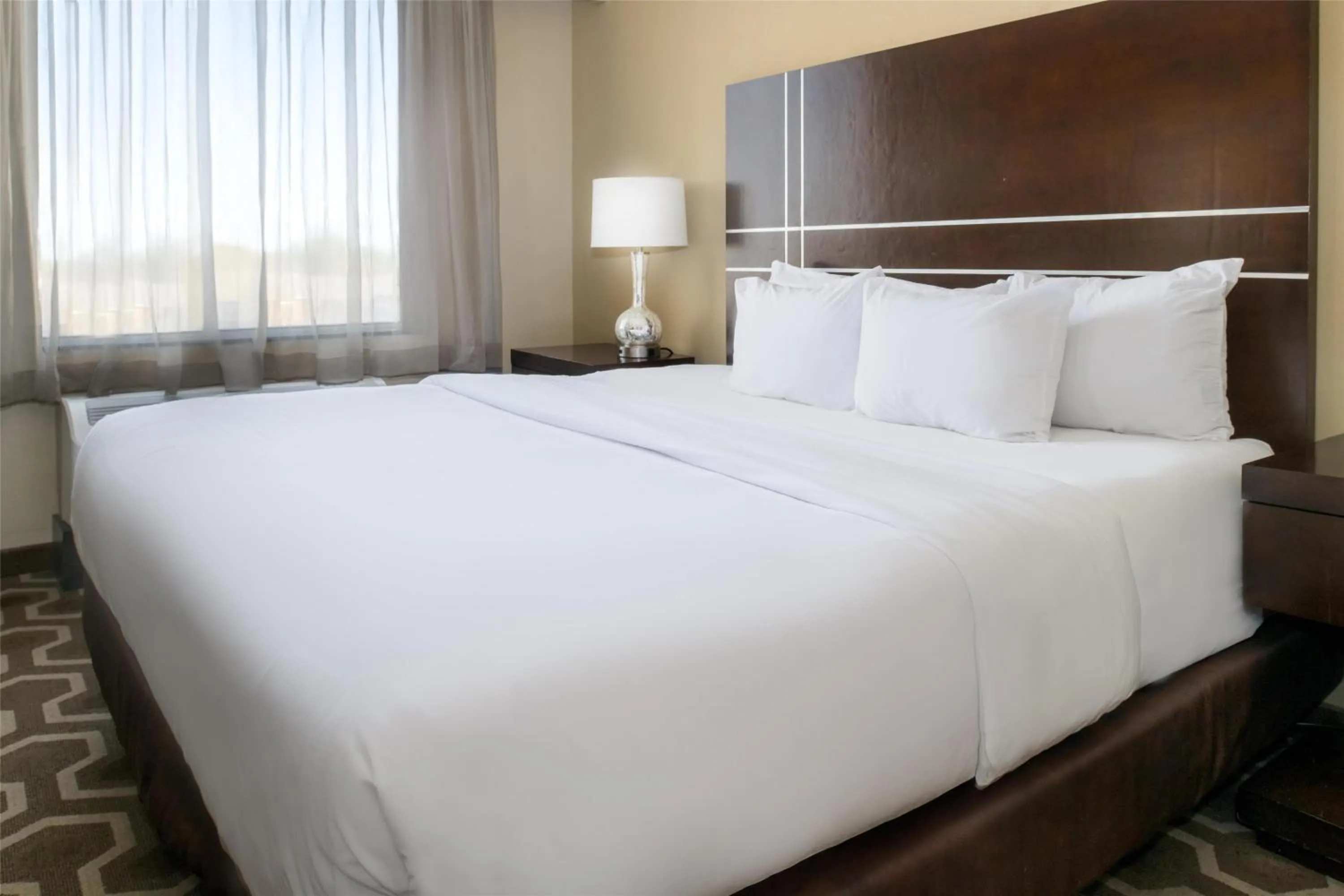 Bed in Embassy Suites by Hilton St Louis Airport