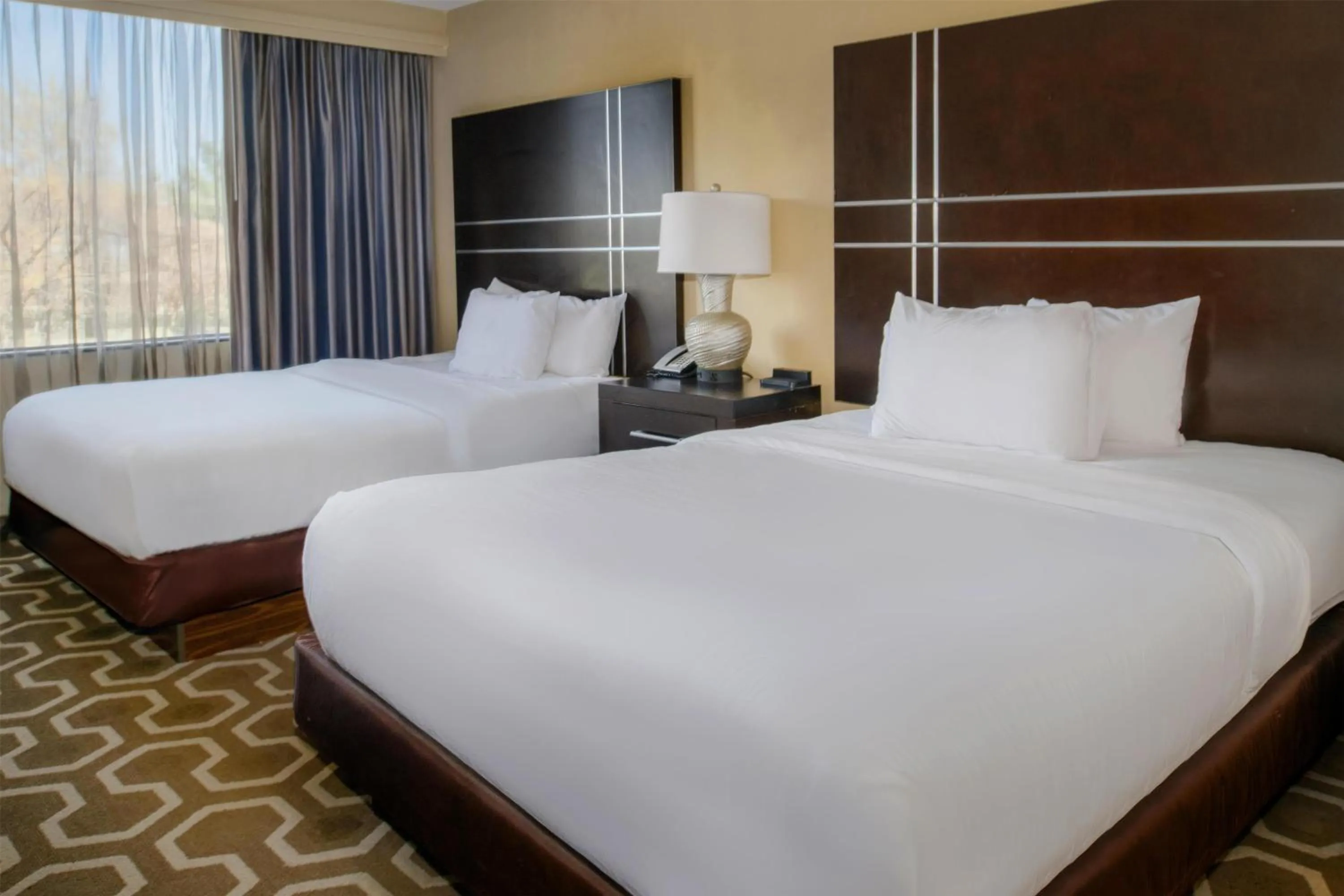 Bed in Embassy Suites by Hilton St Louis Airport