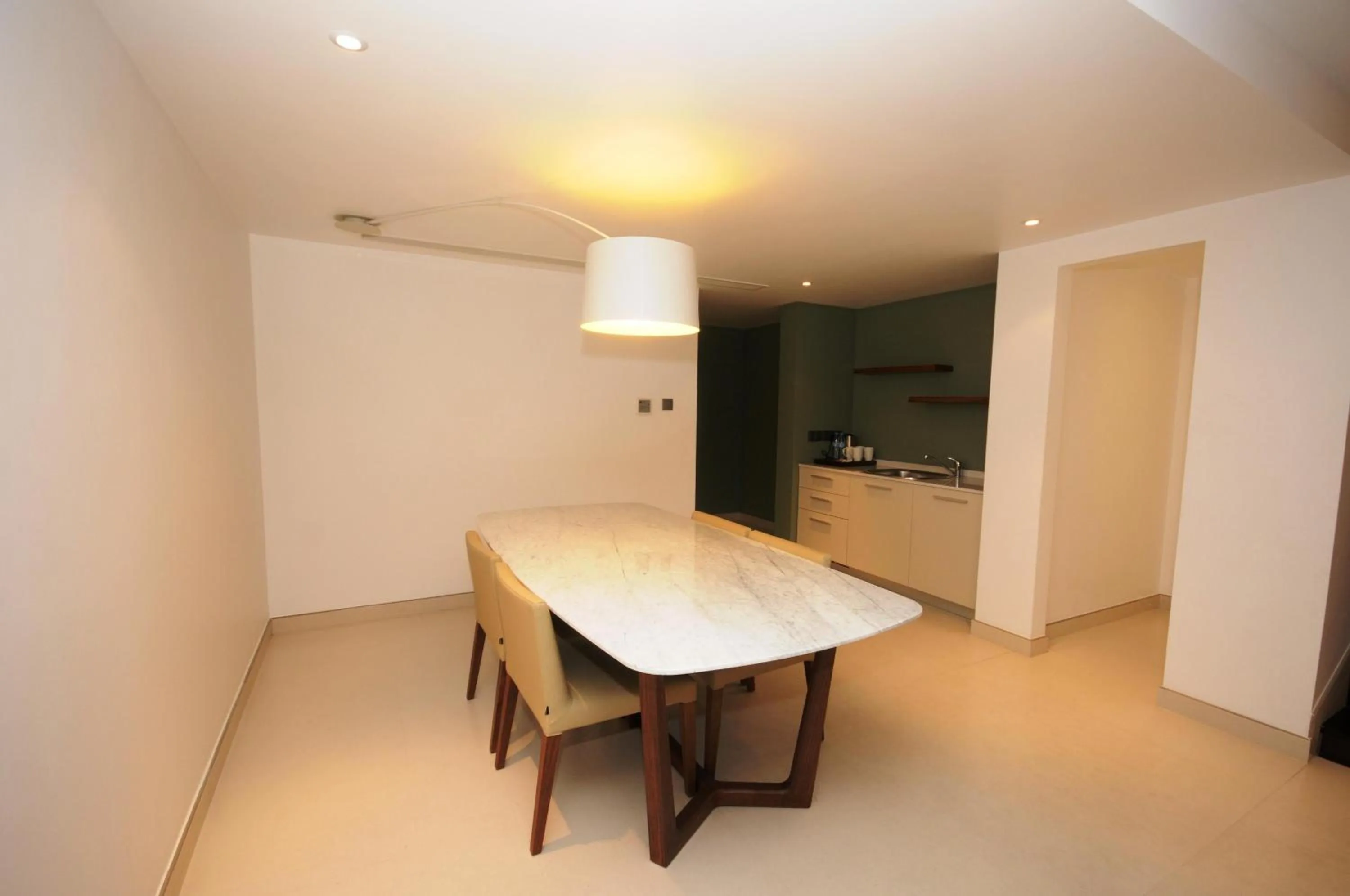 Kitchen or kitchenette in AlBander Hotel & Resort