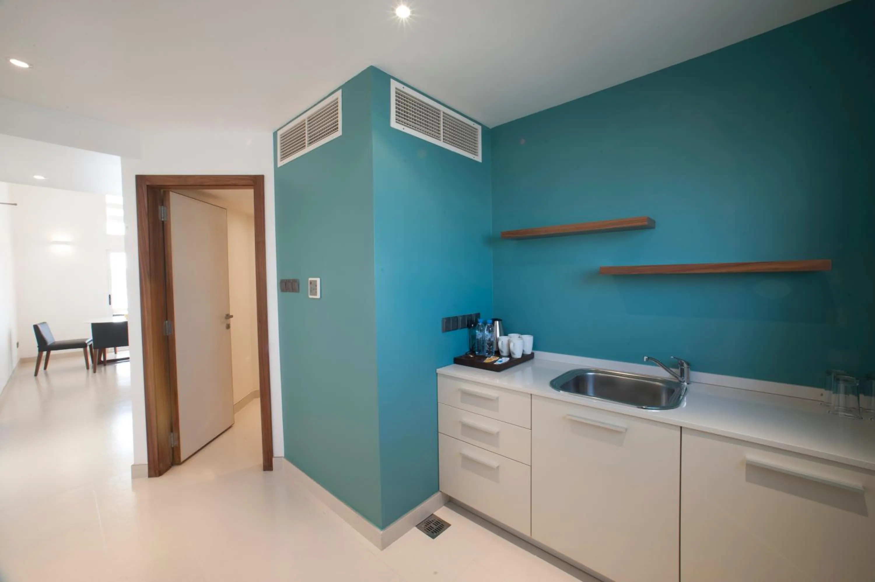 Kitchen or kitchenette in AlBander Hotel & Resort