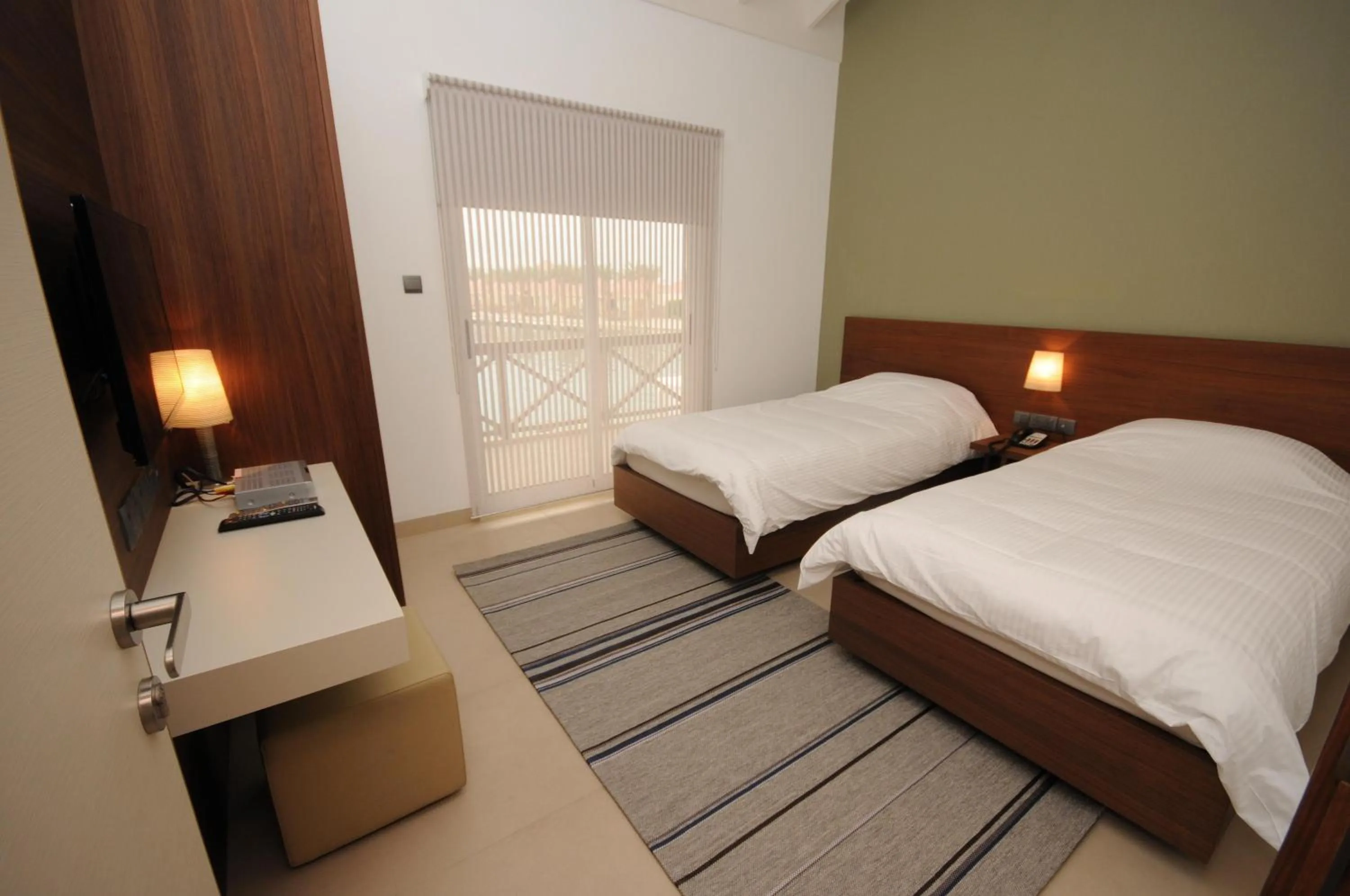 Balcony/Terrace, Bed in AlBander Hotel & Resort