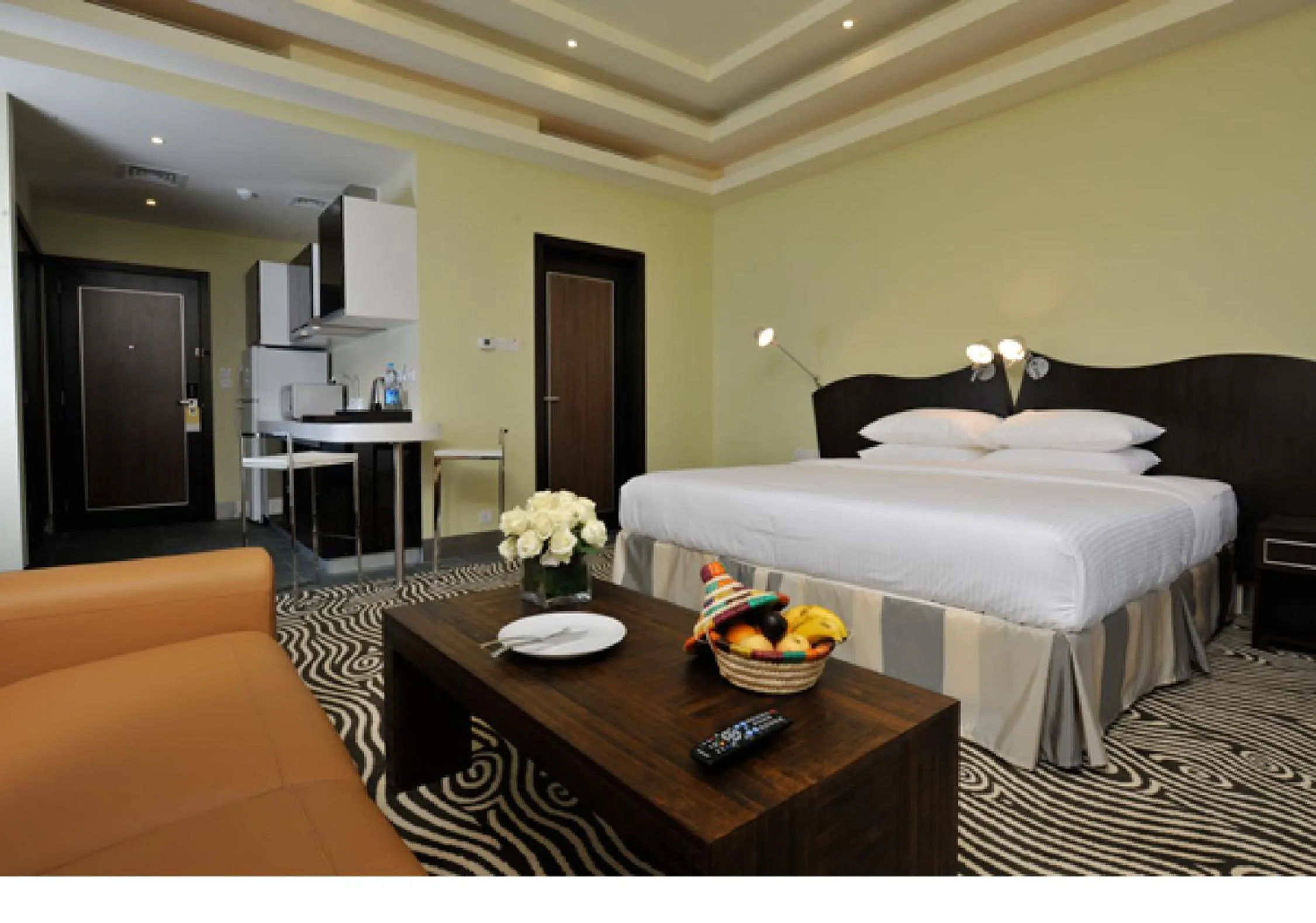 Bed in Al Raya Suites Hotel