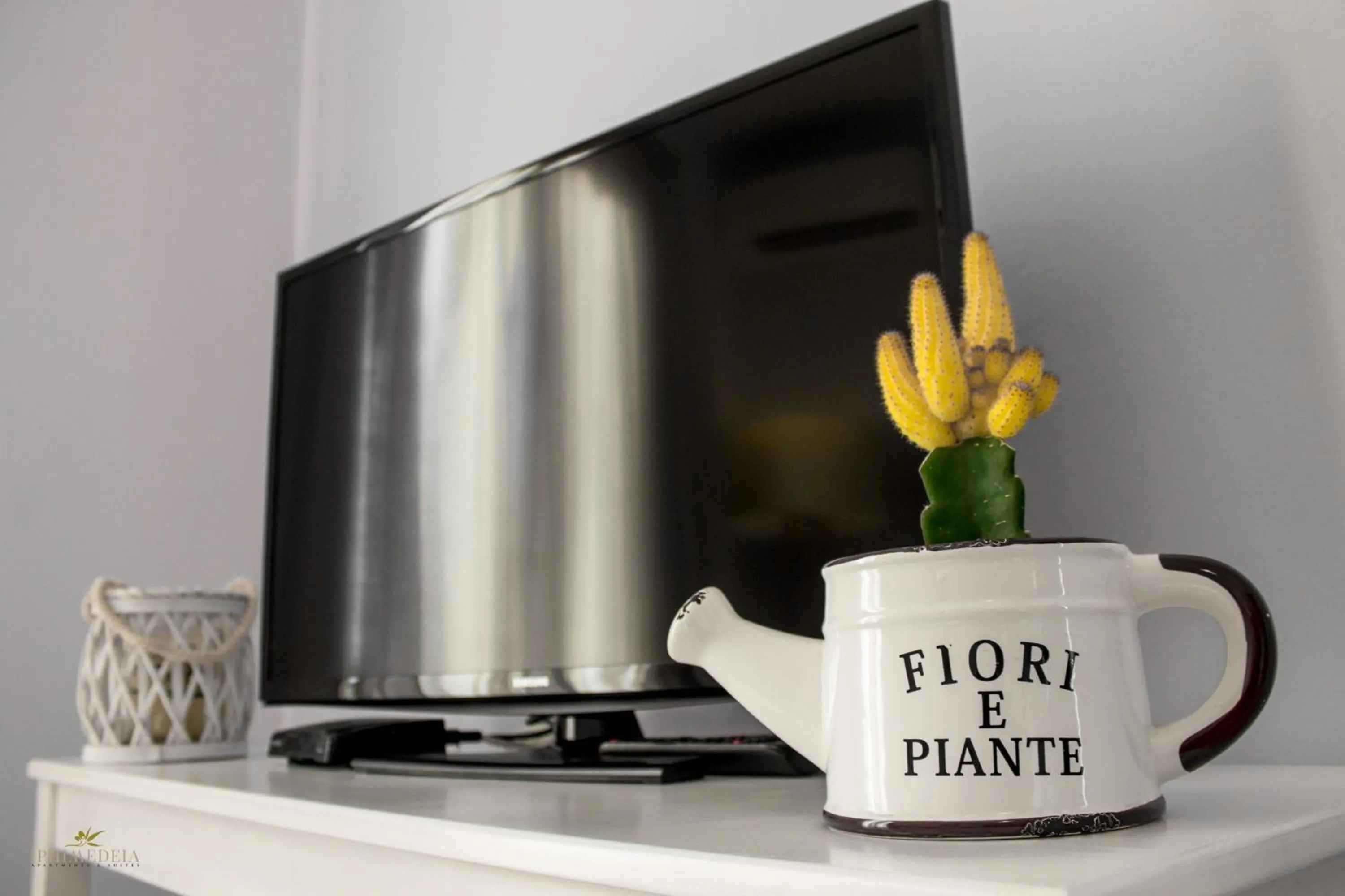 TV and multimedia in Iphimedeia Luxury Hotel & Suites