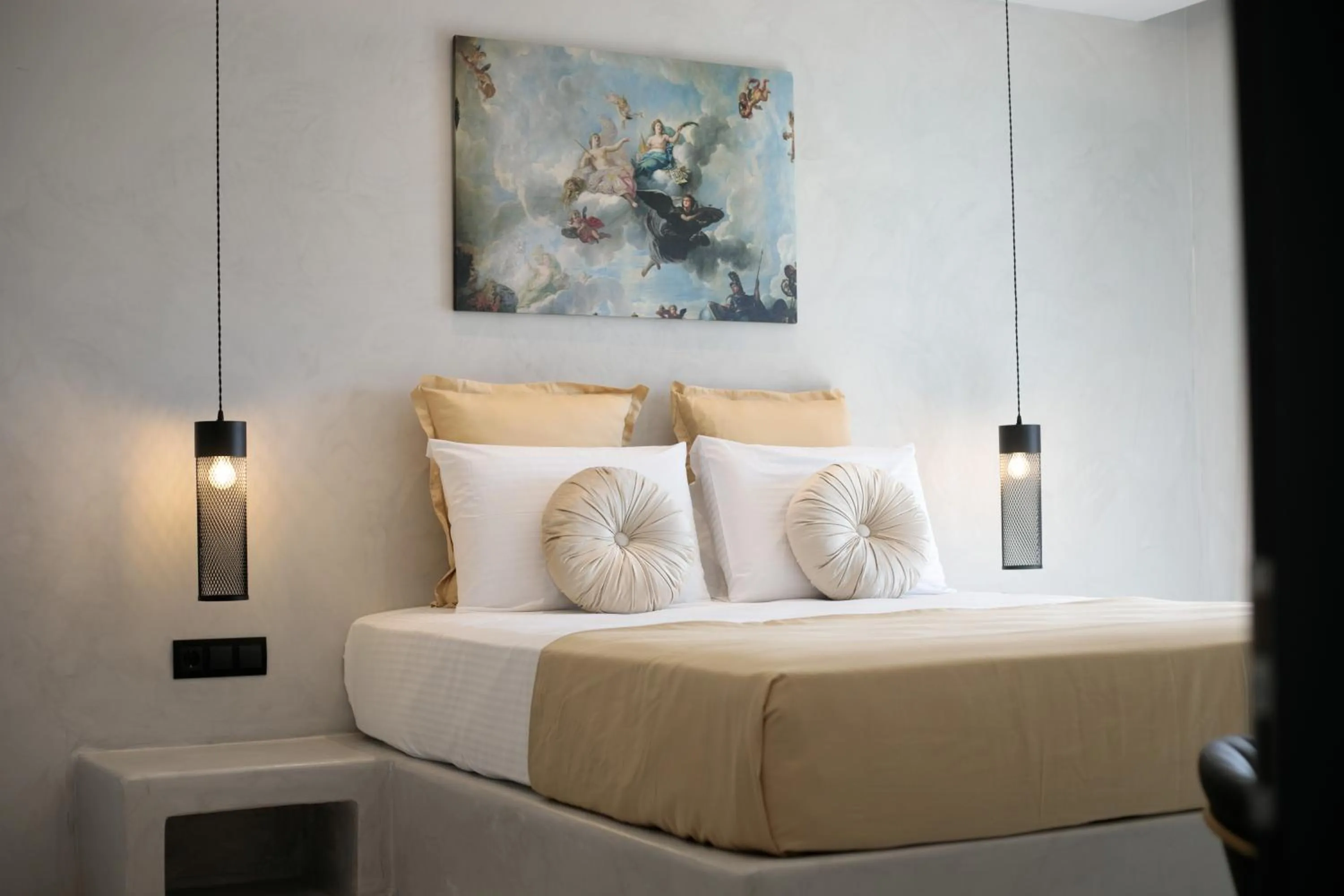 Bed in Iphimedeia Luxury Hotel & Suites