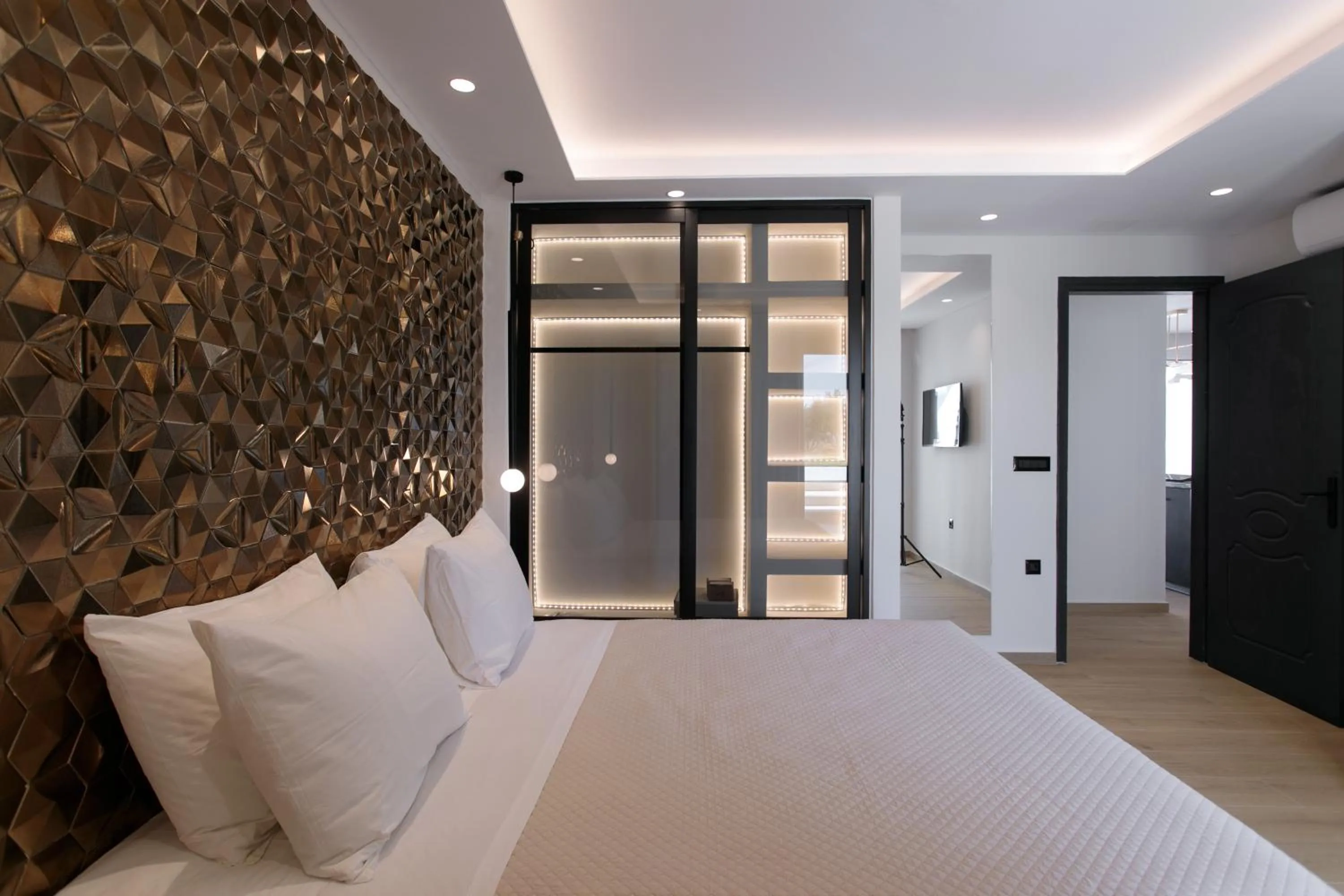 Bed in Iphimedeia Luxury Hotel & Suites