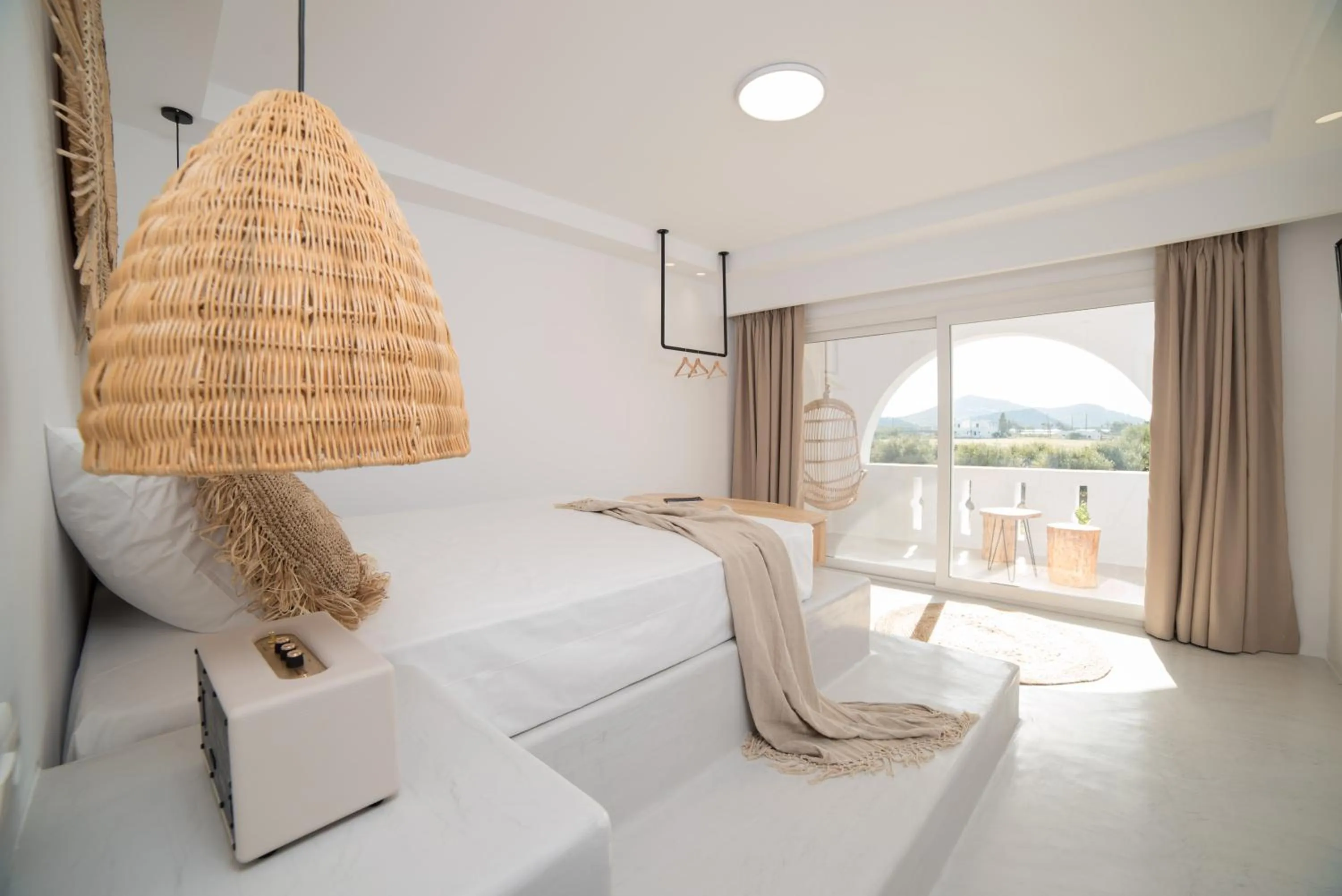 Bed in Iphimedeia Luxury Hotel & Suites