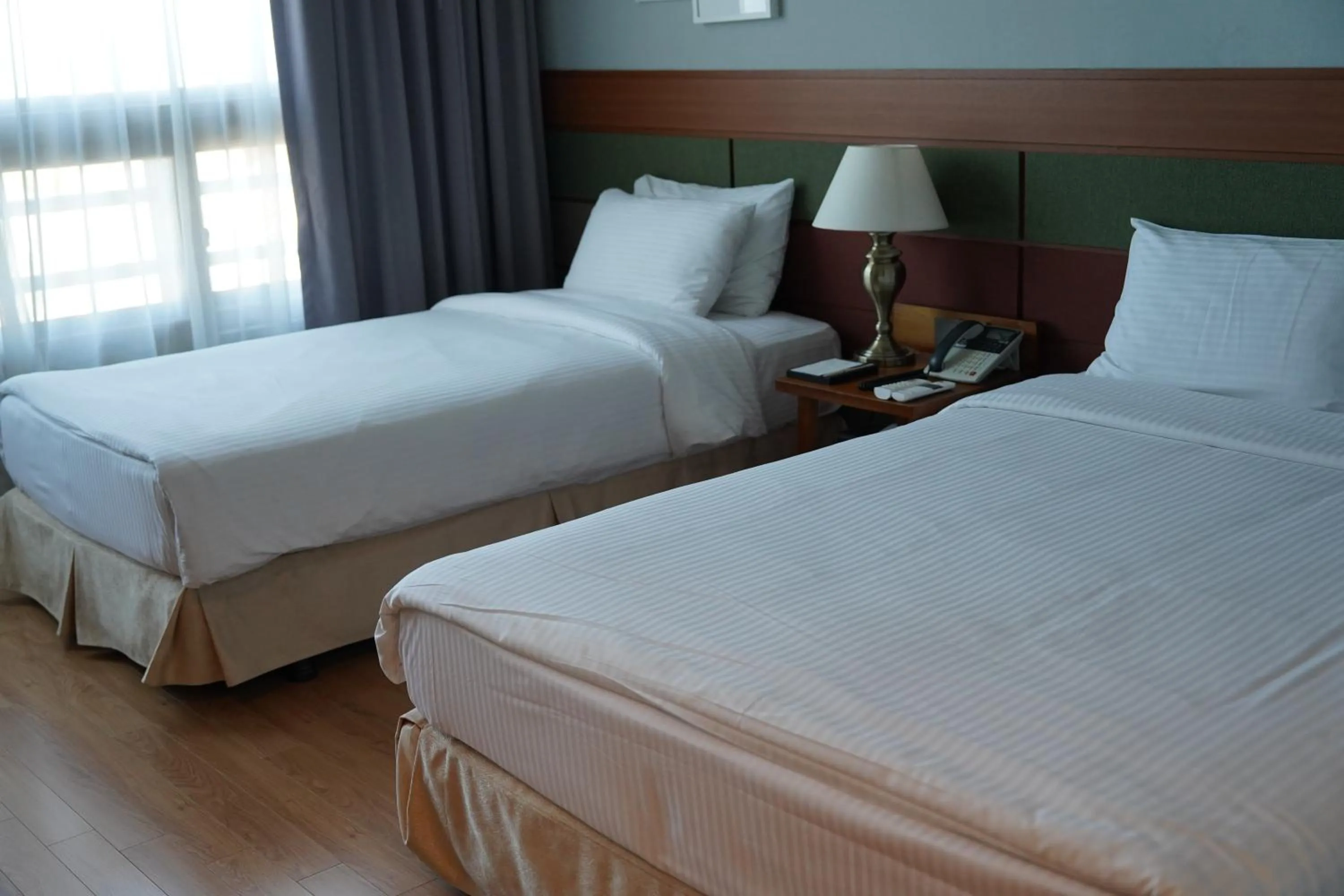 Bed in Sacheon Grand Tourist Hotel