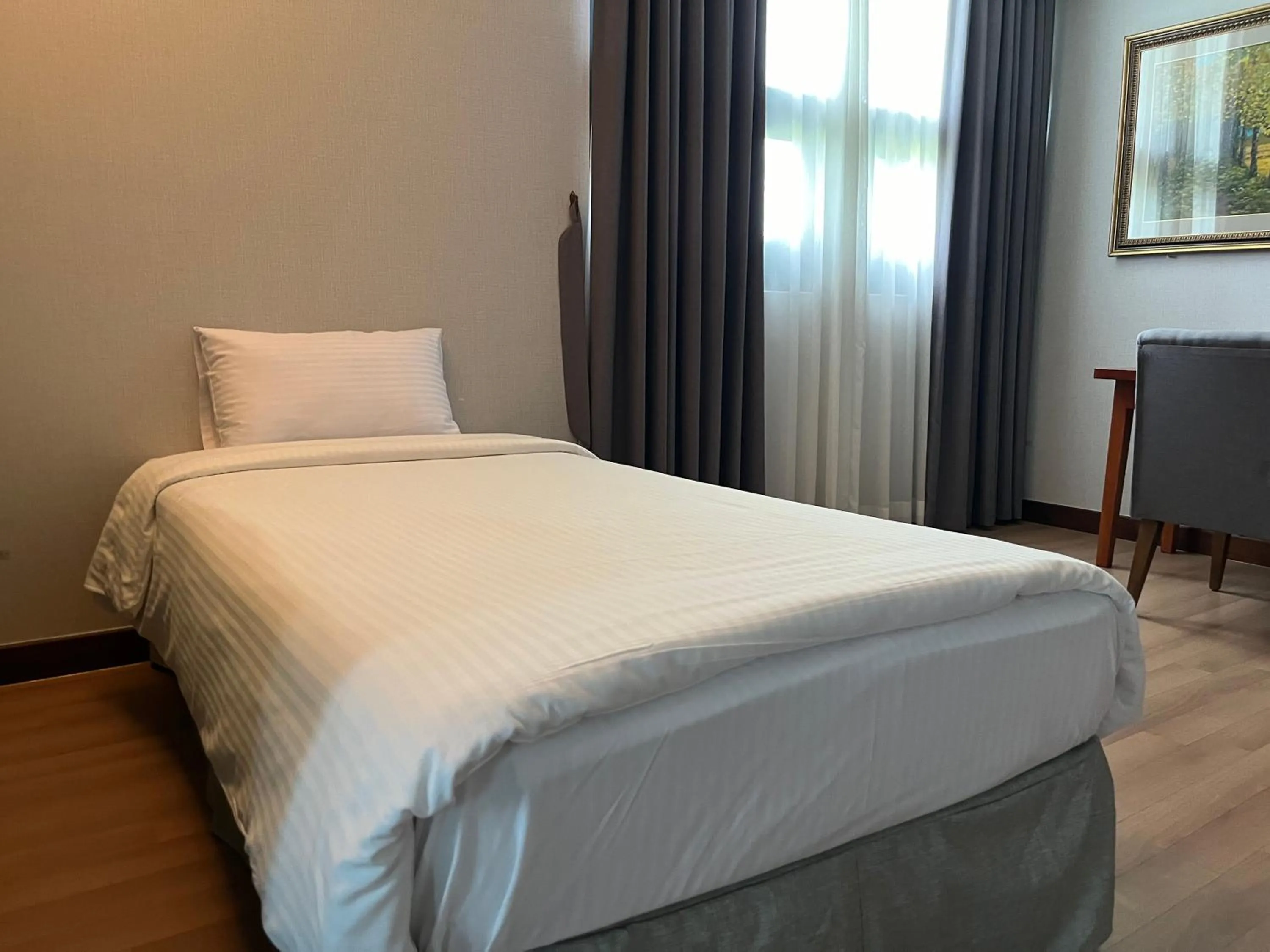 Bed in Sacheon Grand Tourist Hotel