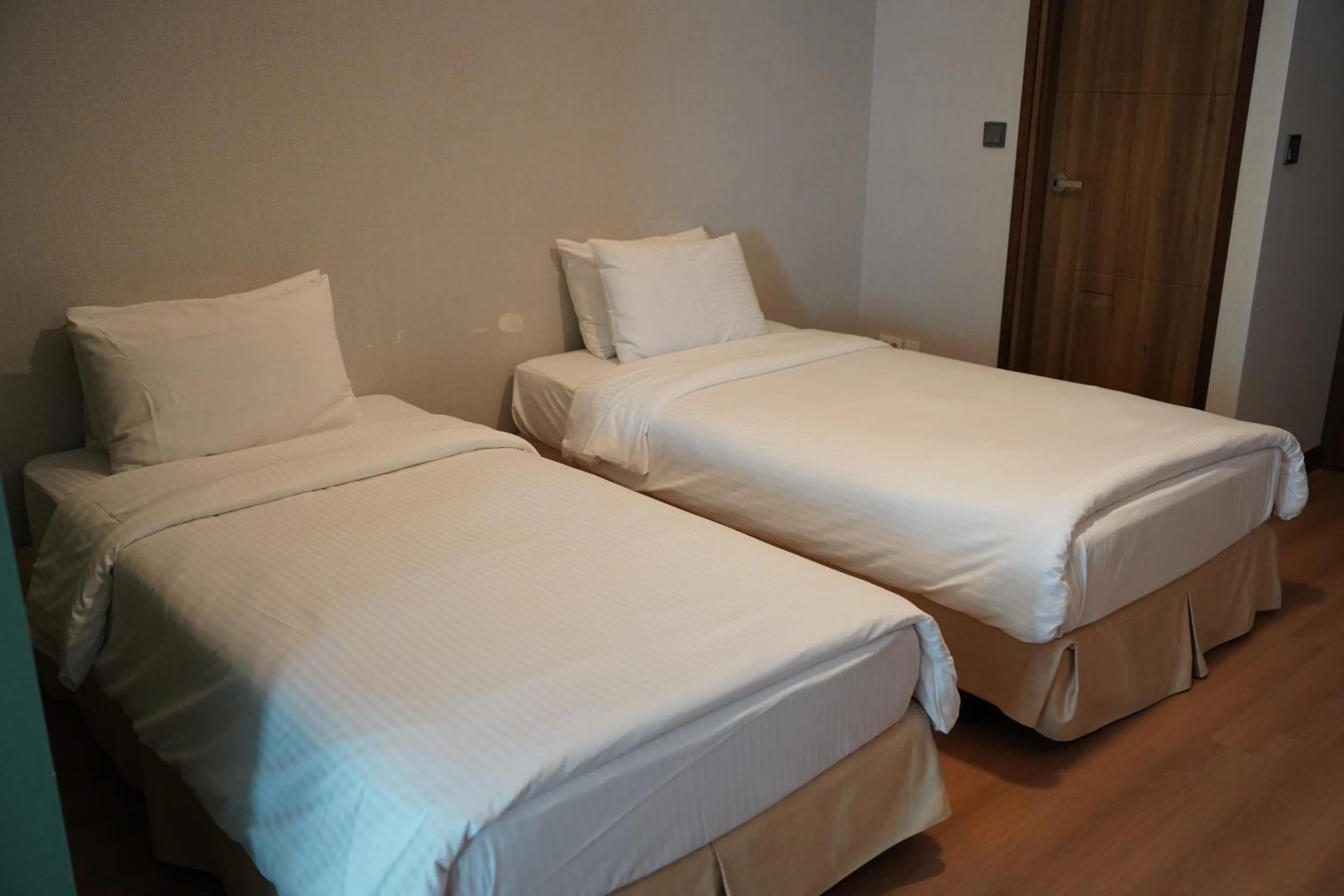 Bed in Sacheon Grand Tourist Hotel