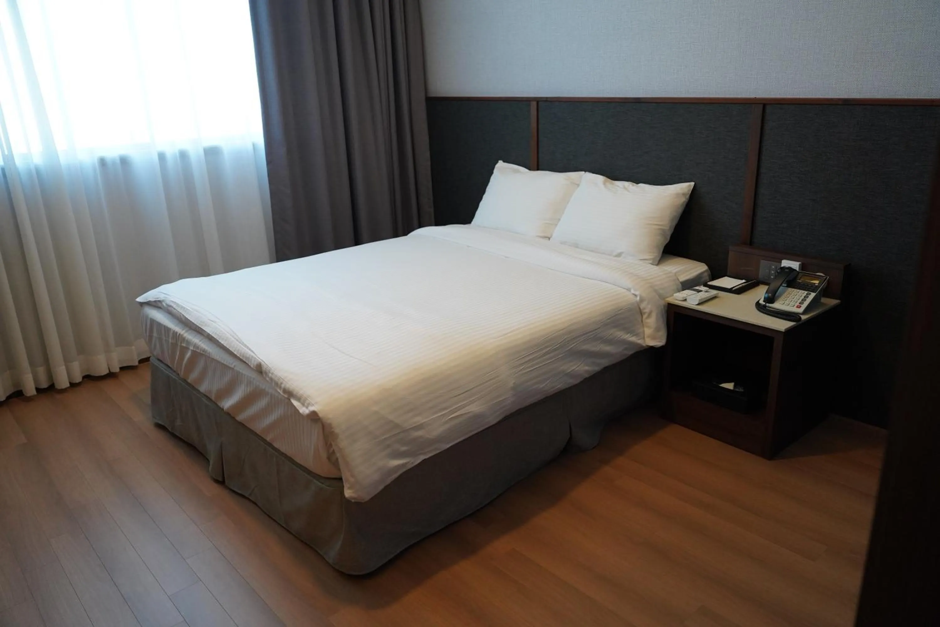 Bed in Sacheon Grand Tourist Hotel