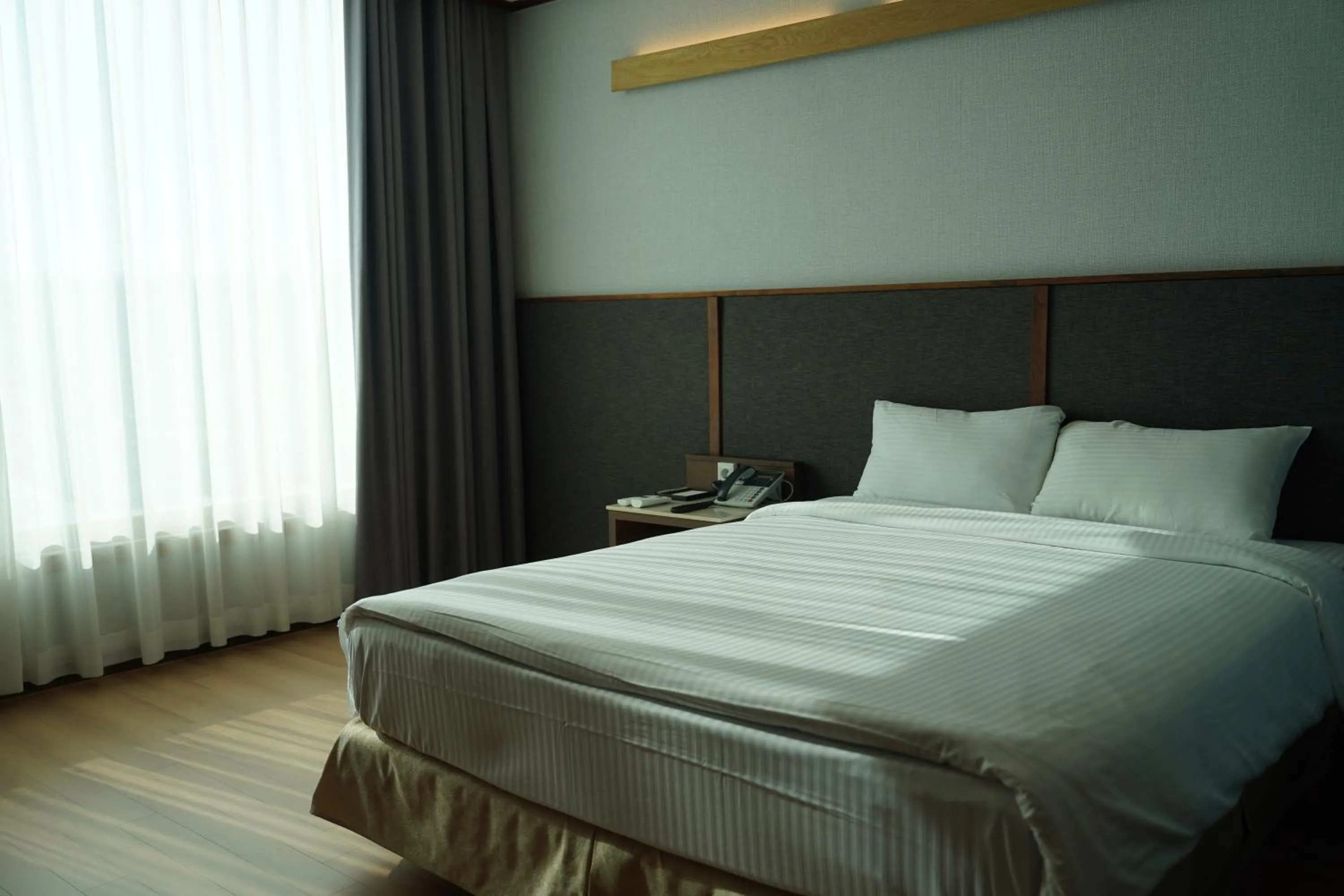 Bed in Sacheon Grand Tourist Hotel