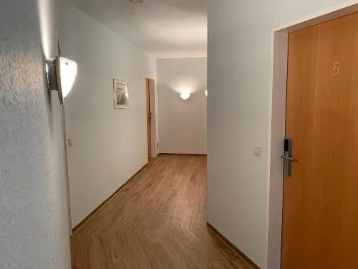 Communal lounge/ TV room in Hotel Flora