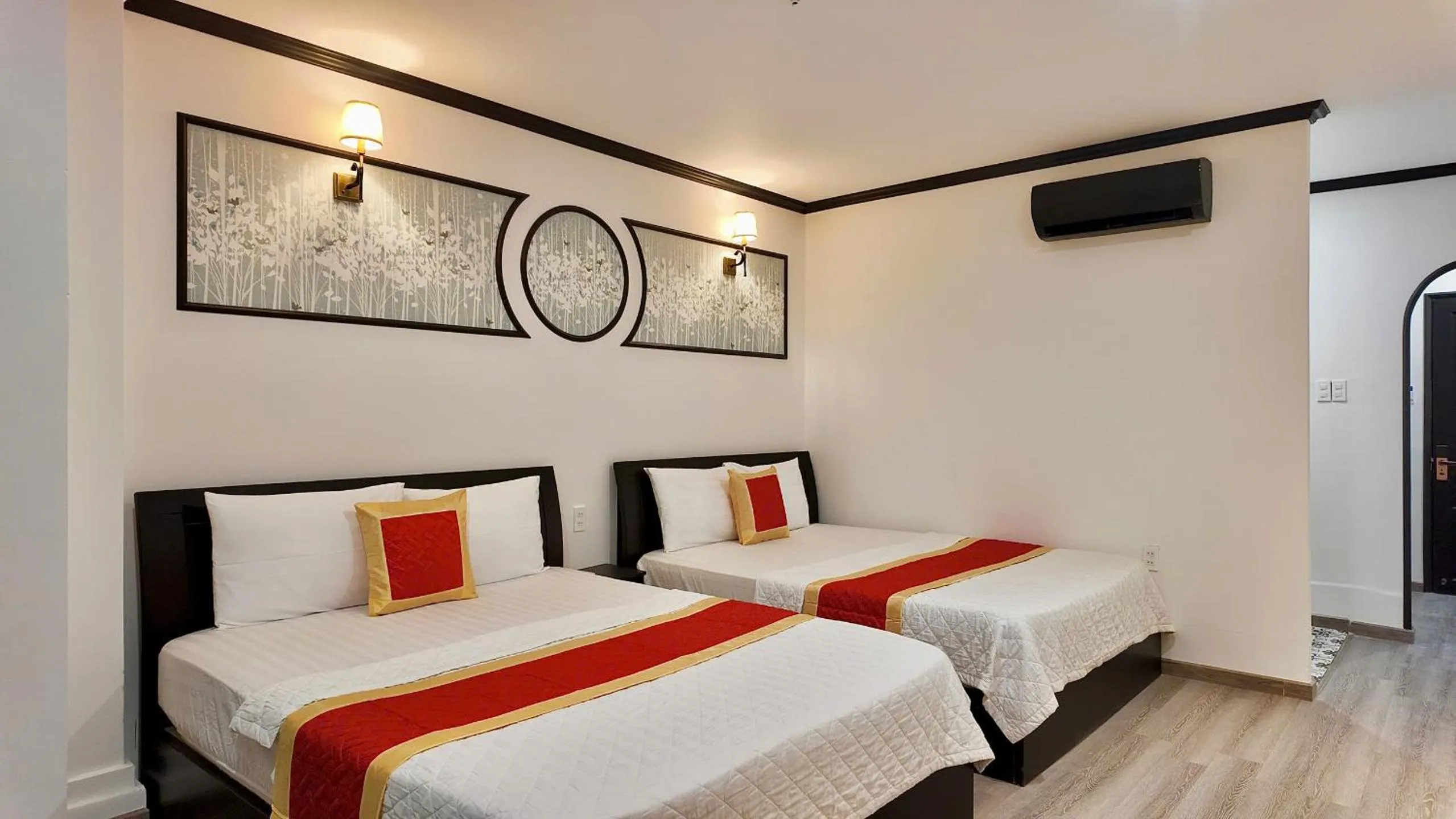 Bed in Phu Gia Hotel 193 Nguyen Thai Hoc