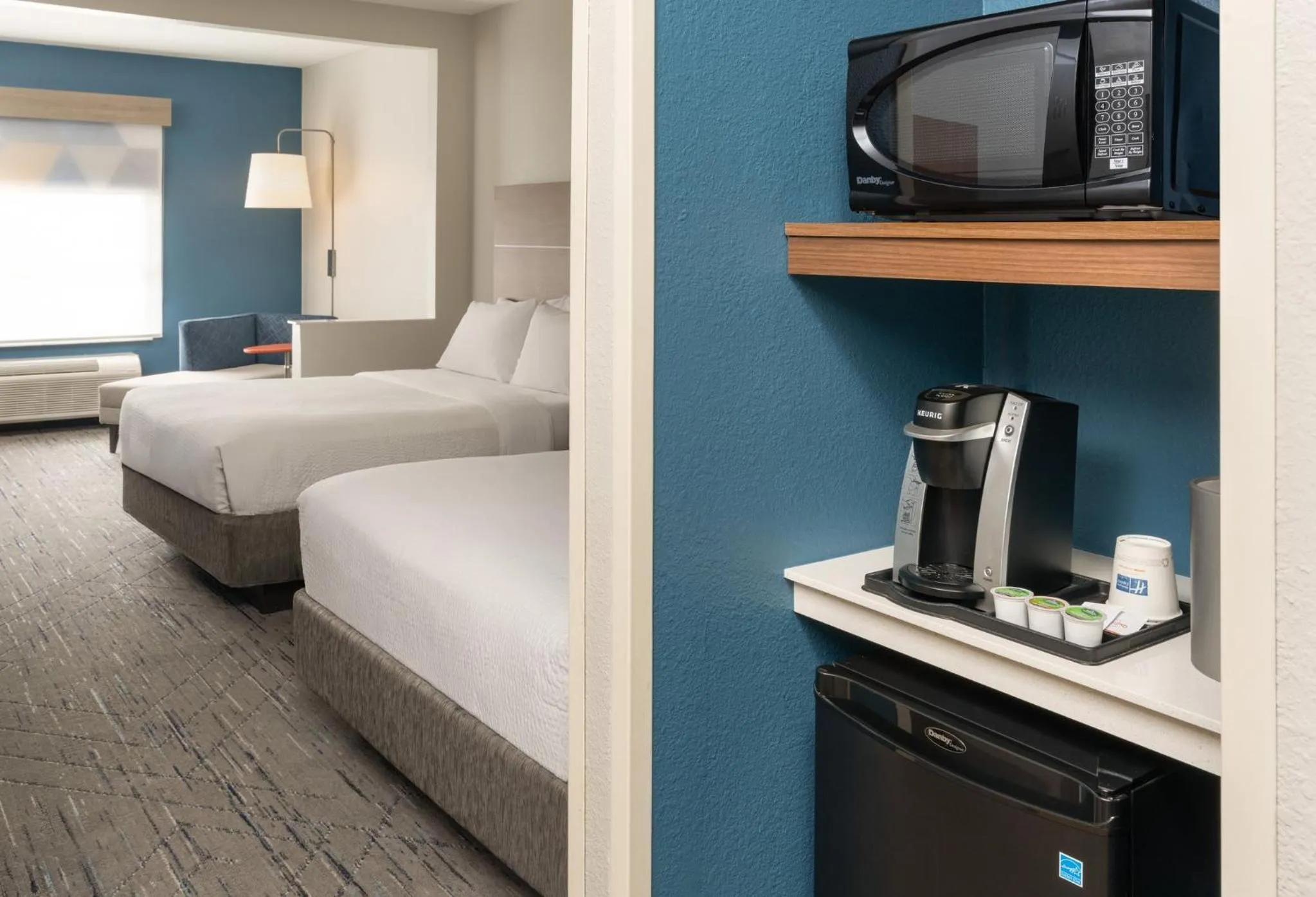 Photo of the whole room, Bed in Holiday Inn Express & Suites Orlando International Airport by IHG