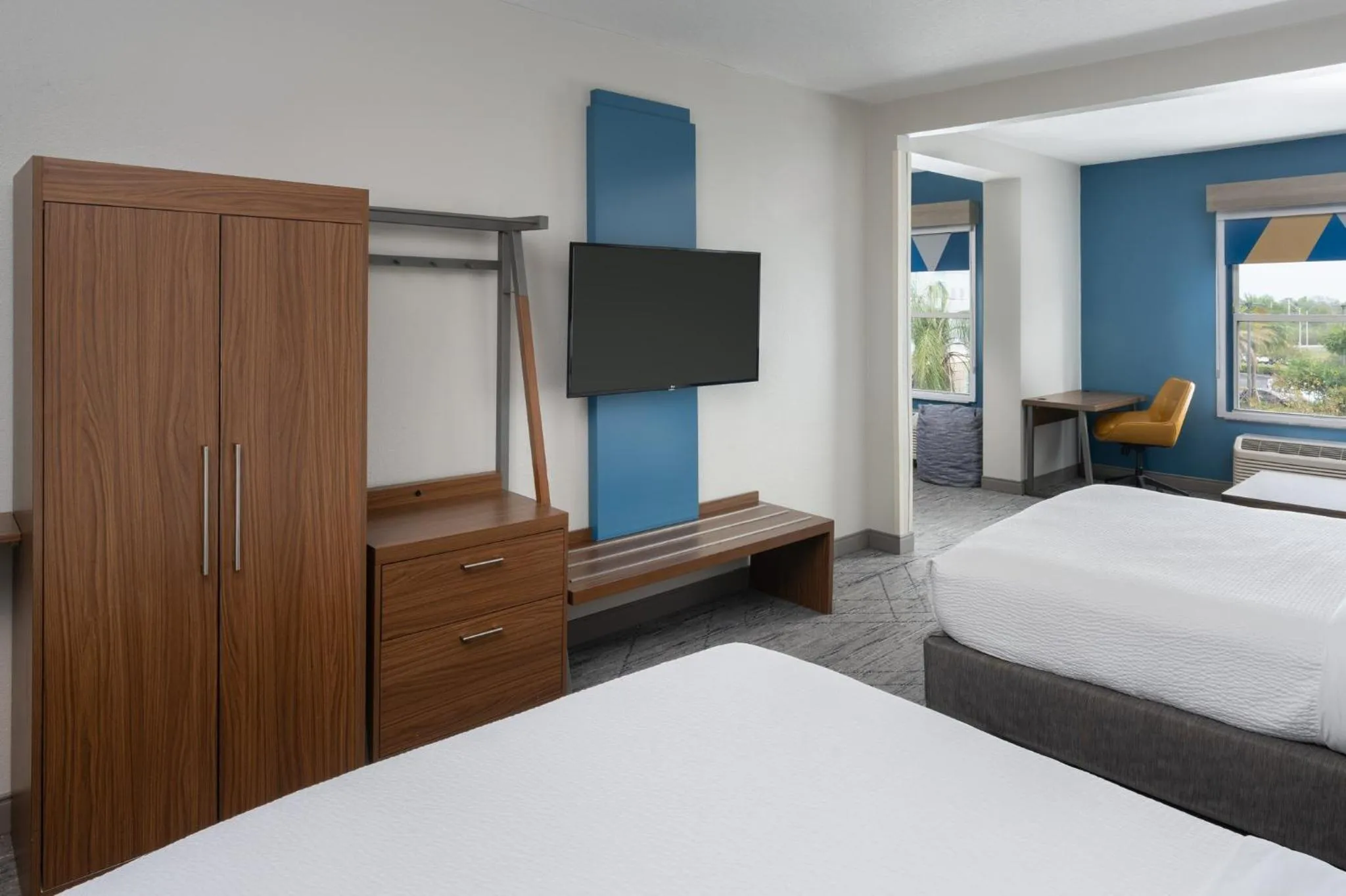 Bedroom, Bed in Holiday Inn Express & Suites Orlando International Airport by IHG
