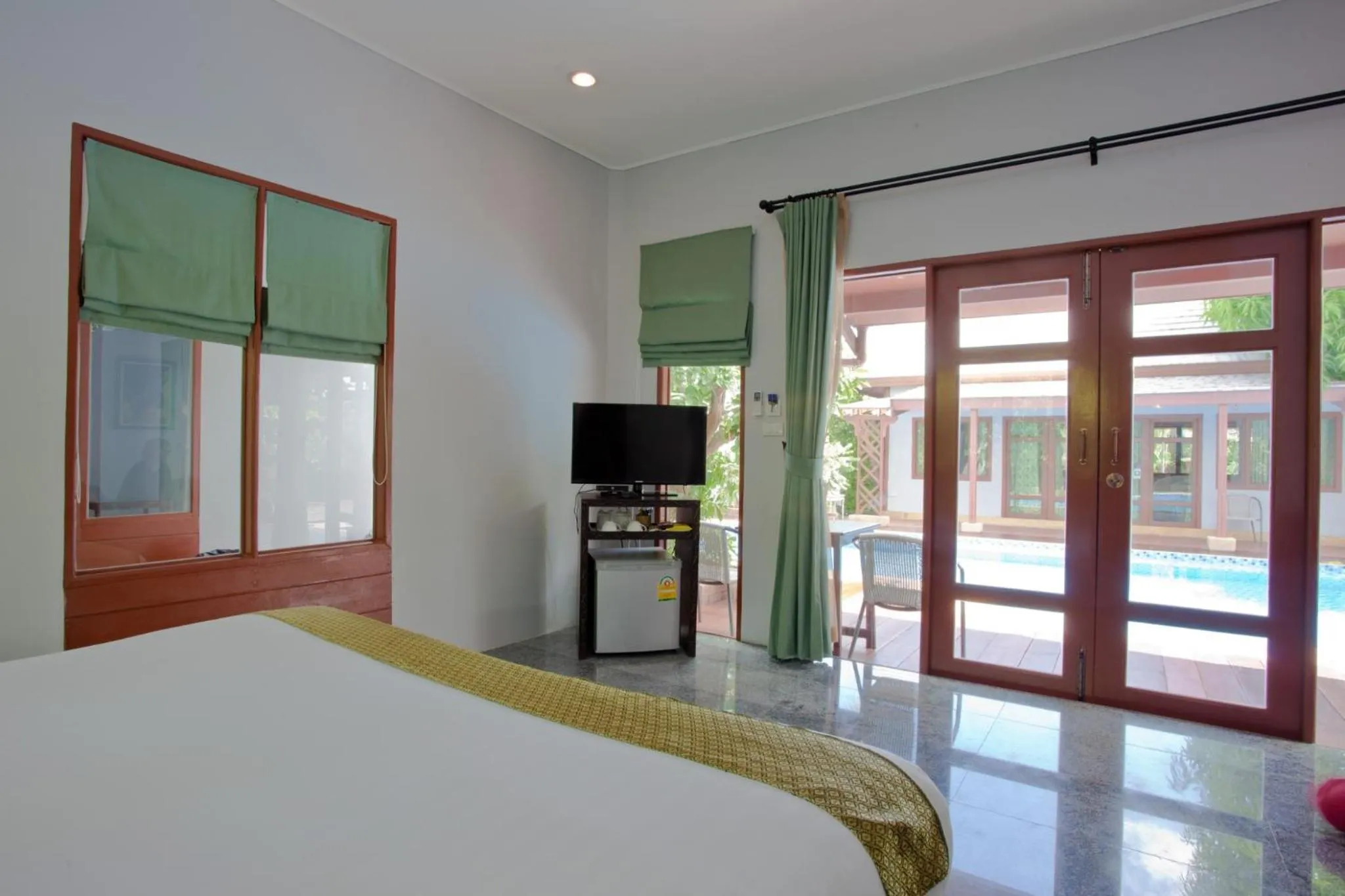 Bed in Ardea Resort Pool Villa