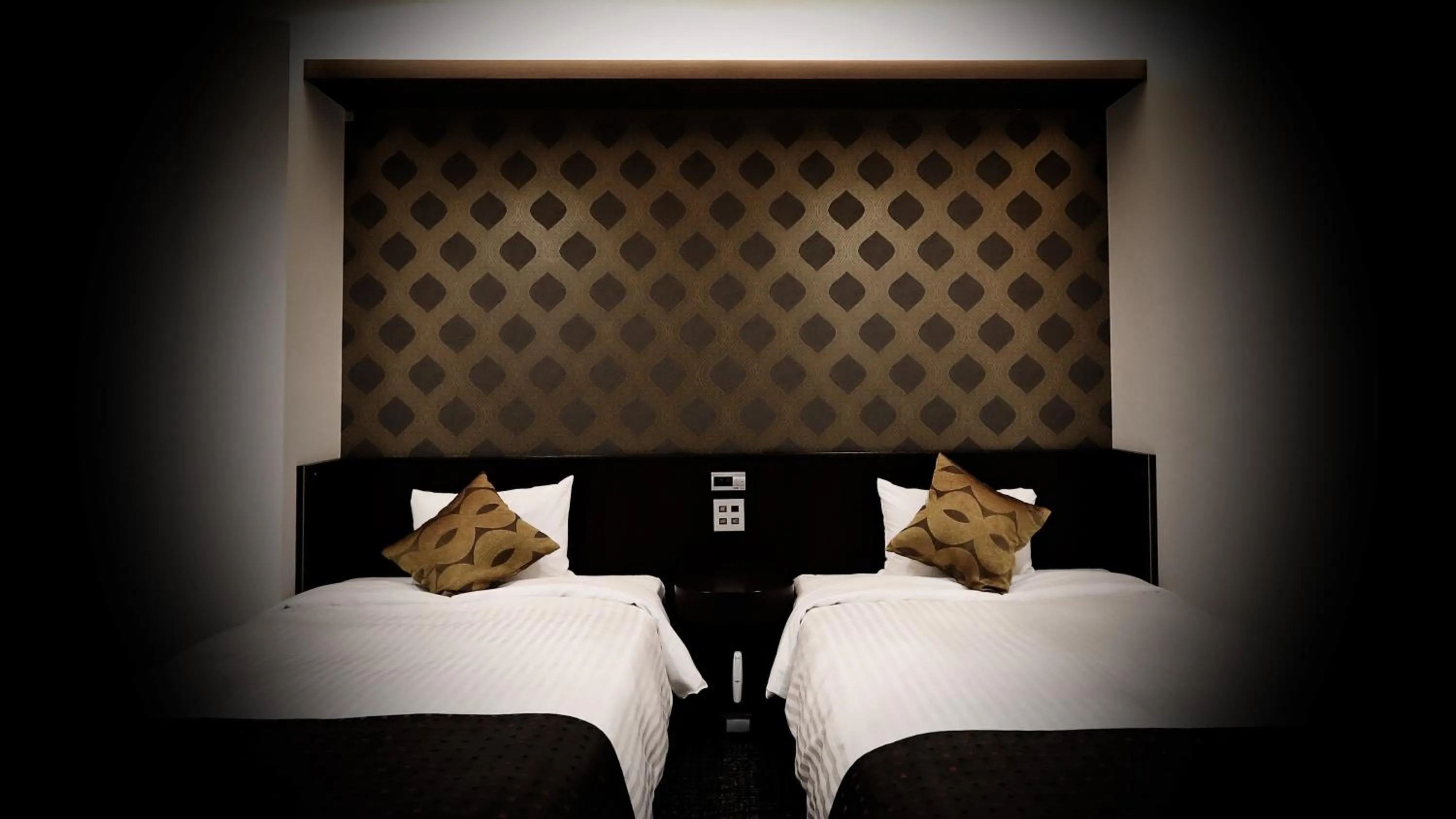 Bed in Hotel Annex Inn