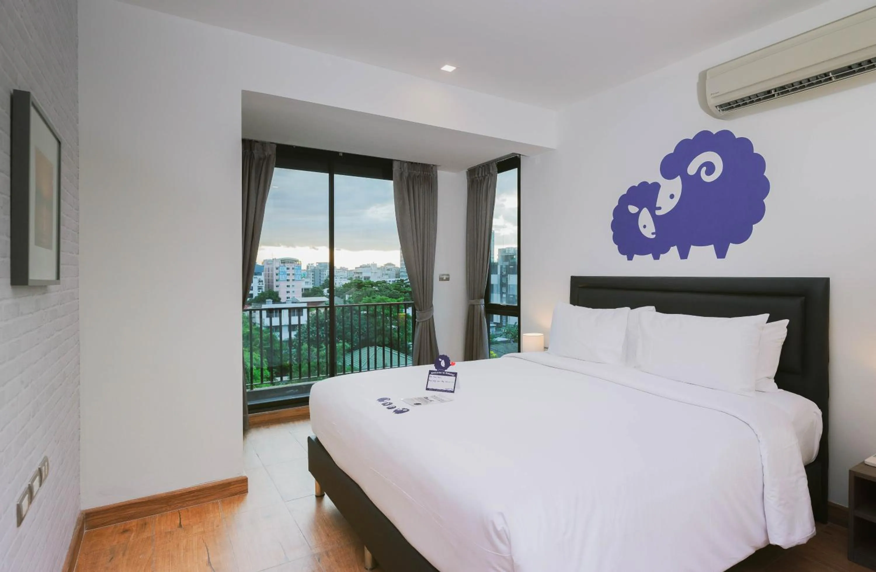 Bed in Kokotel Bangkok Sukhumvit 50