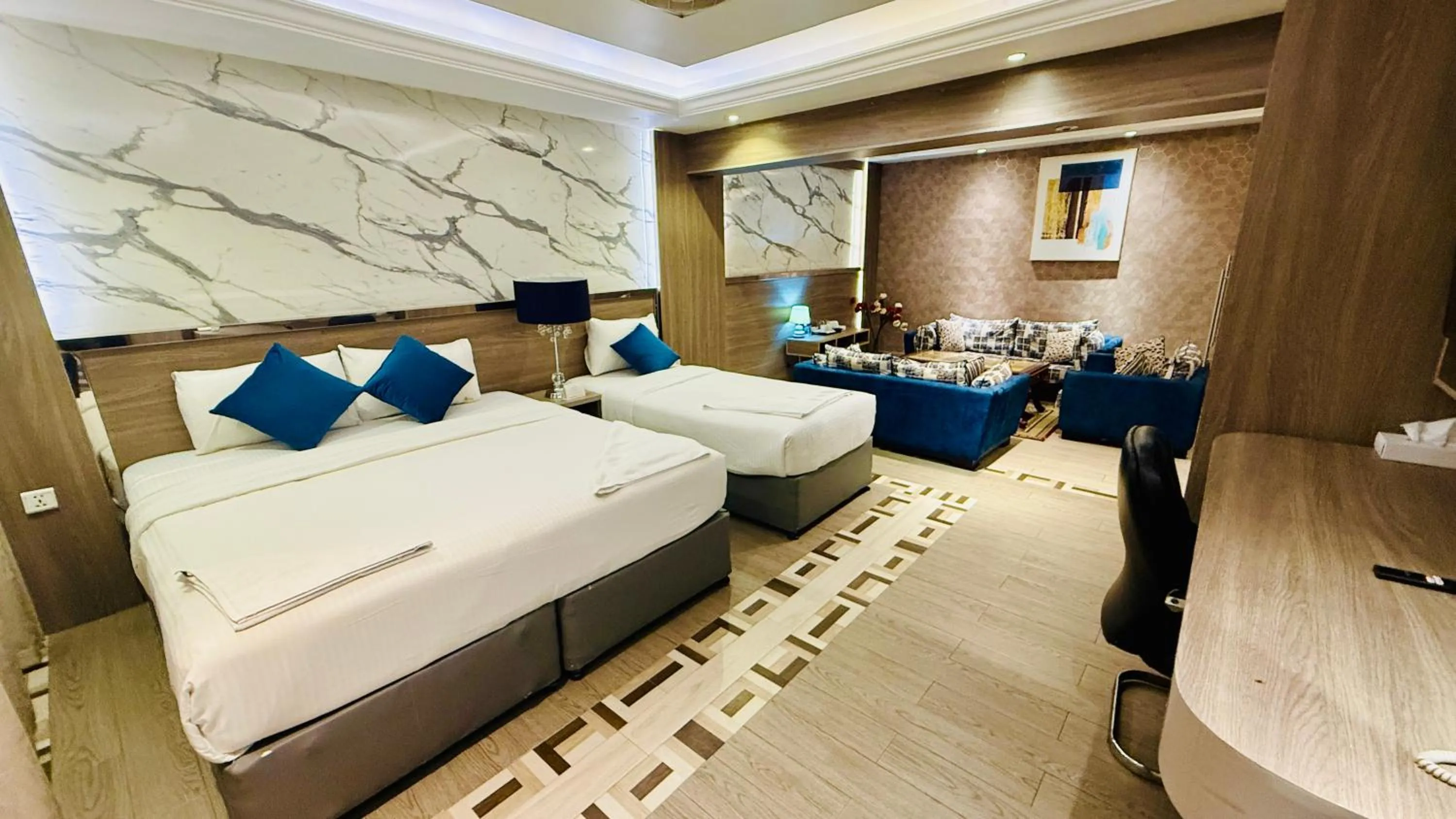 Bed in Trans World Hotel