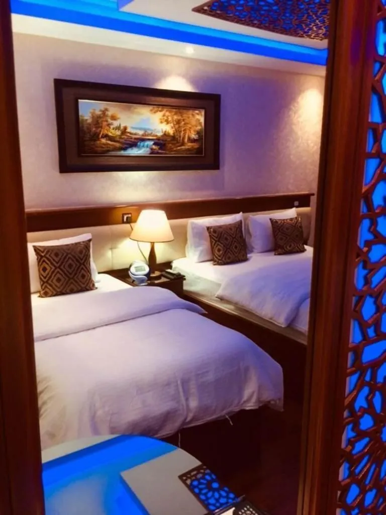 Bed in Trans World Hotel