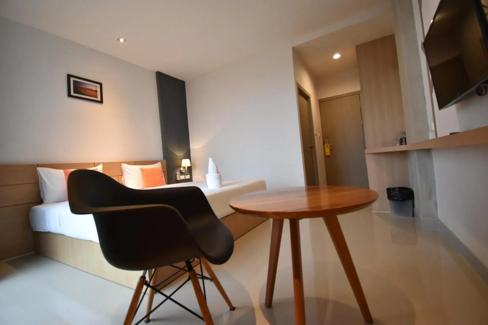 Seating area, Bed in B Boutique Hotel