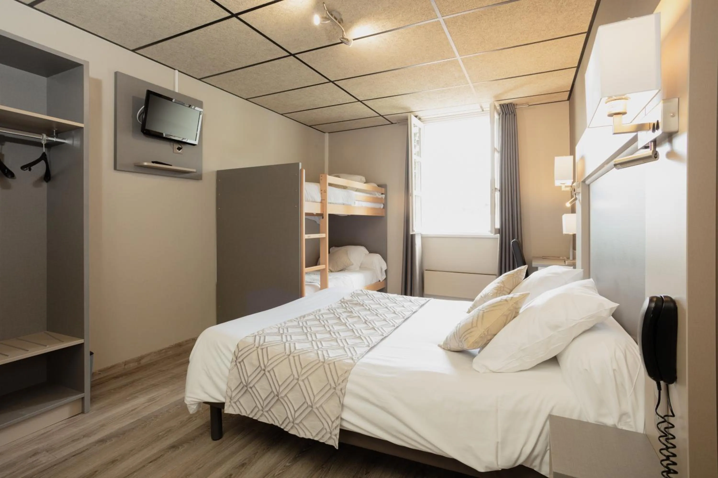 Bedroom, Bed in Logis Hotel Restaurant Family & Spa