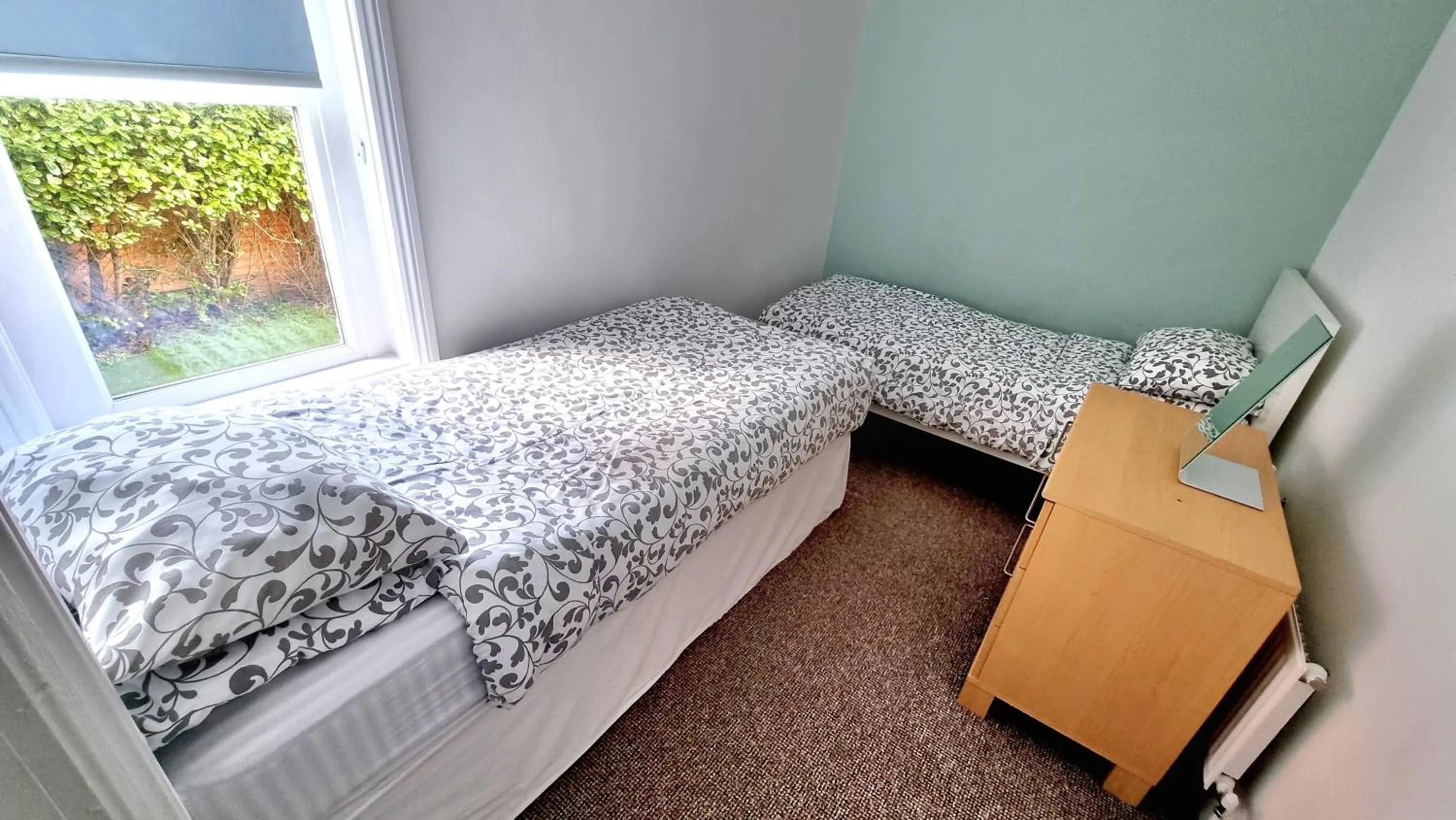 Bedroom, Bed in Beachcomber Holiday Apartments