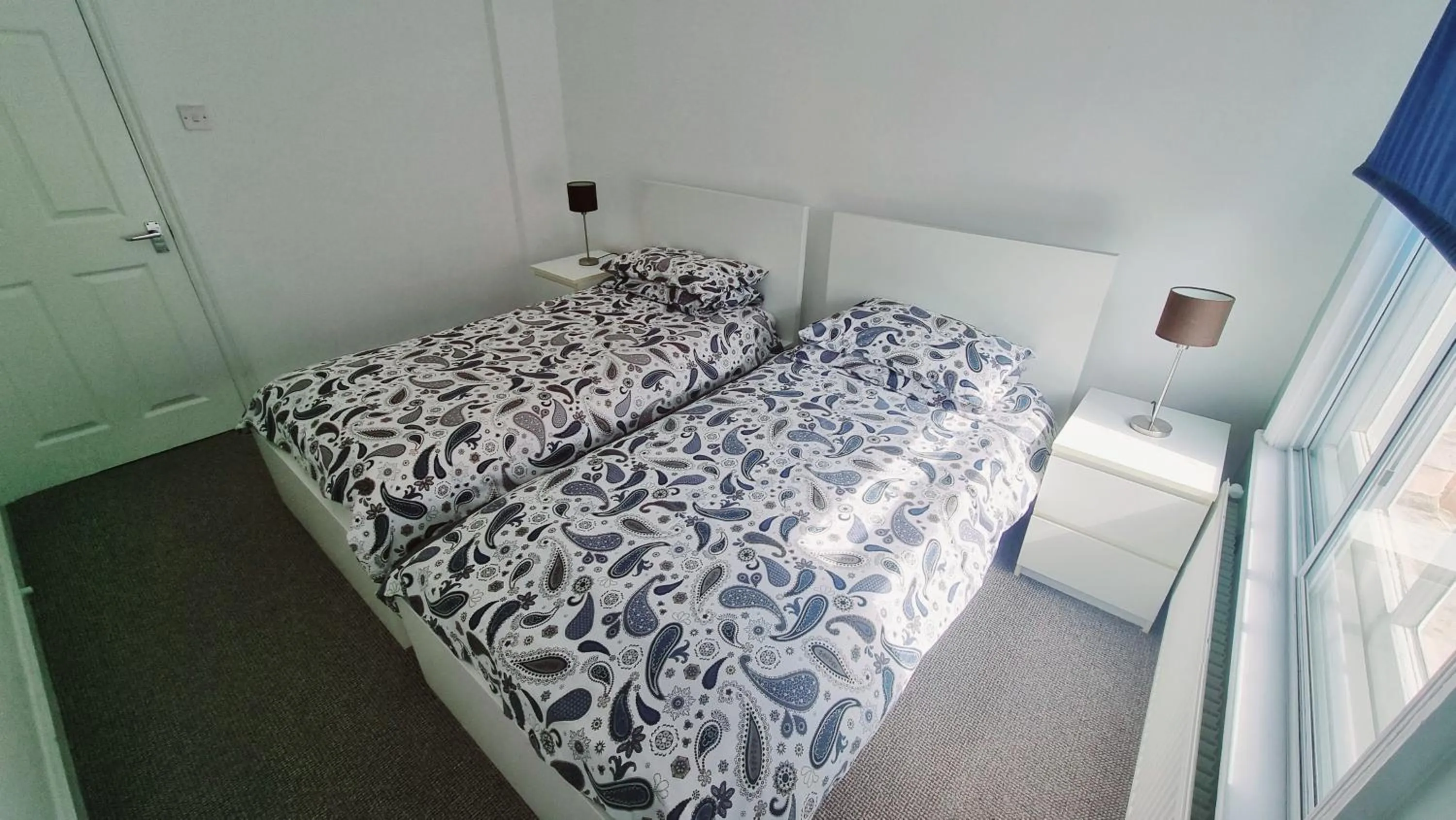 Bedroom, Bed in Beachcomber Holiday Apartments