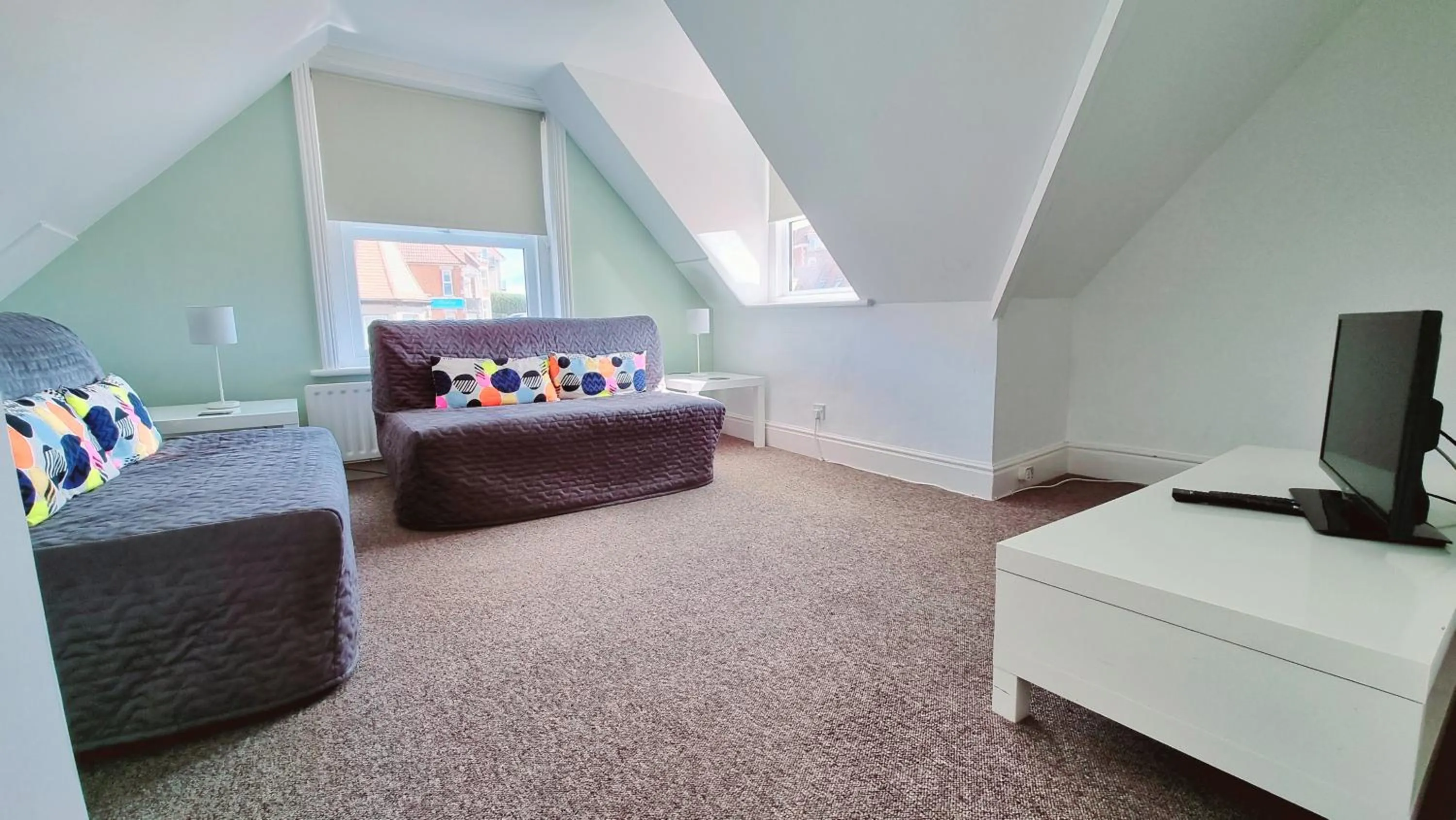 Bedroom in Beachcomber Holiday Apartments