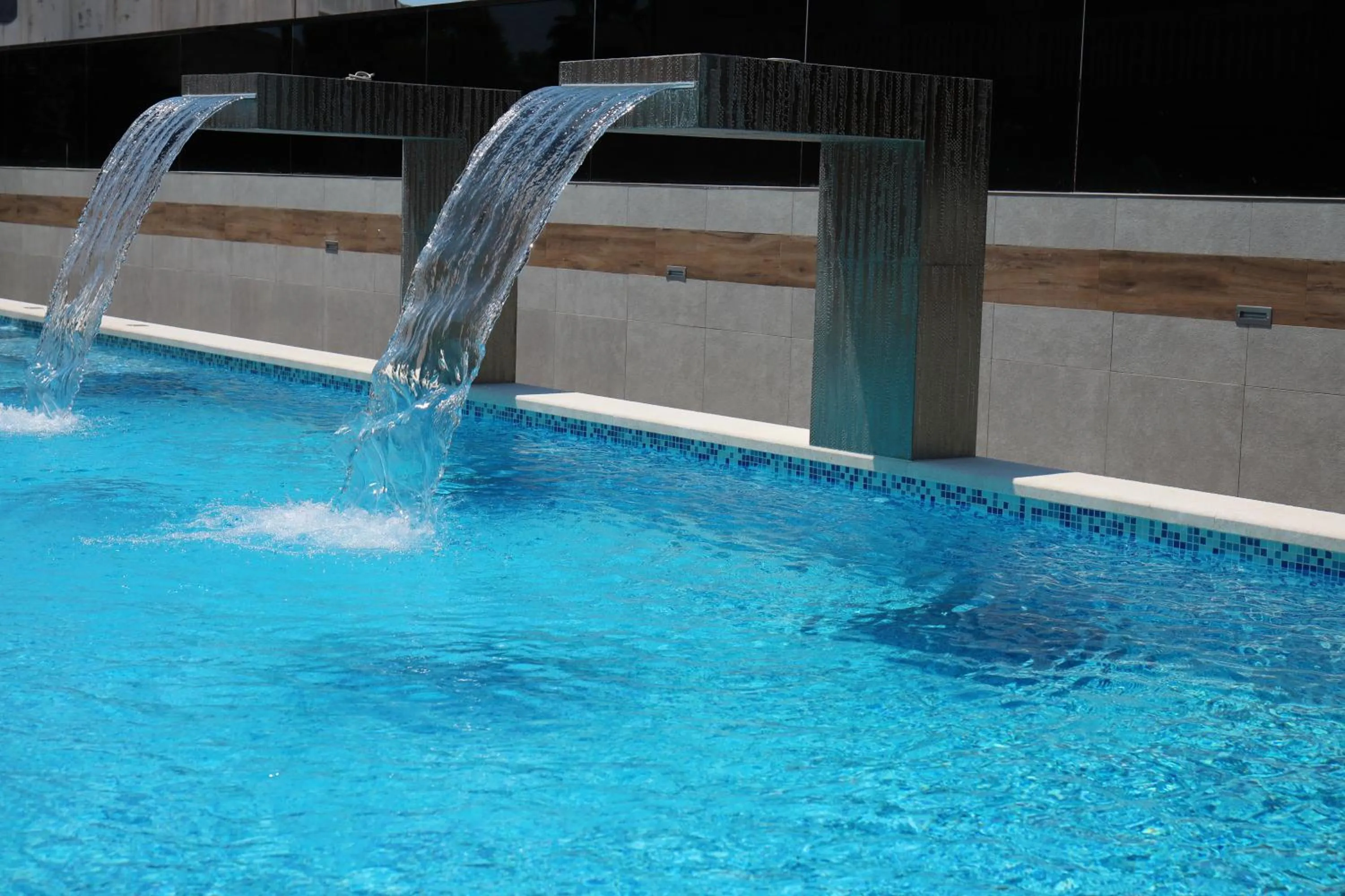 Swimming pool in Boutique Apartments Ad Astra