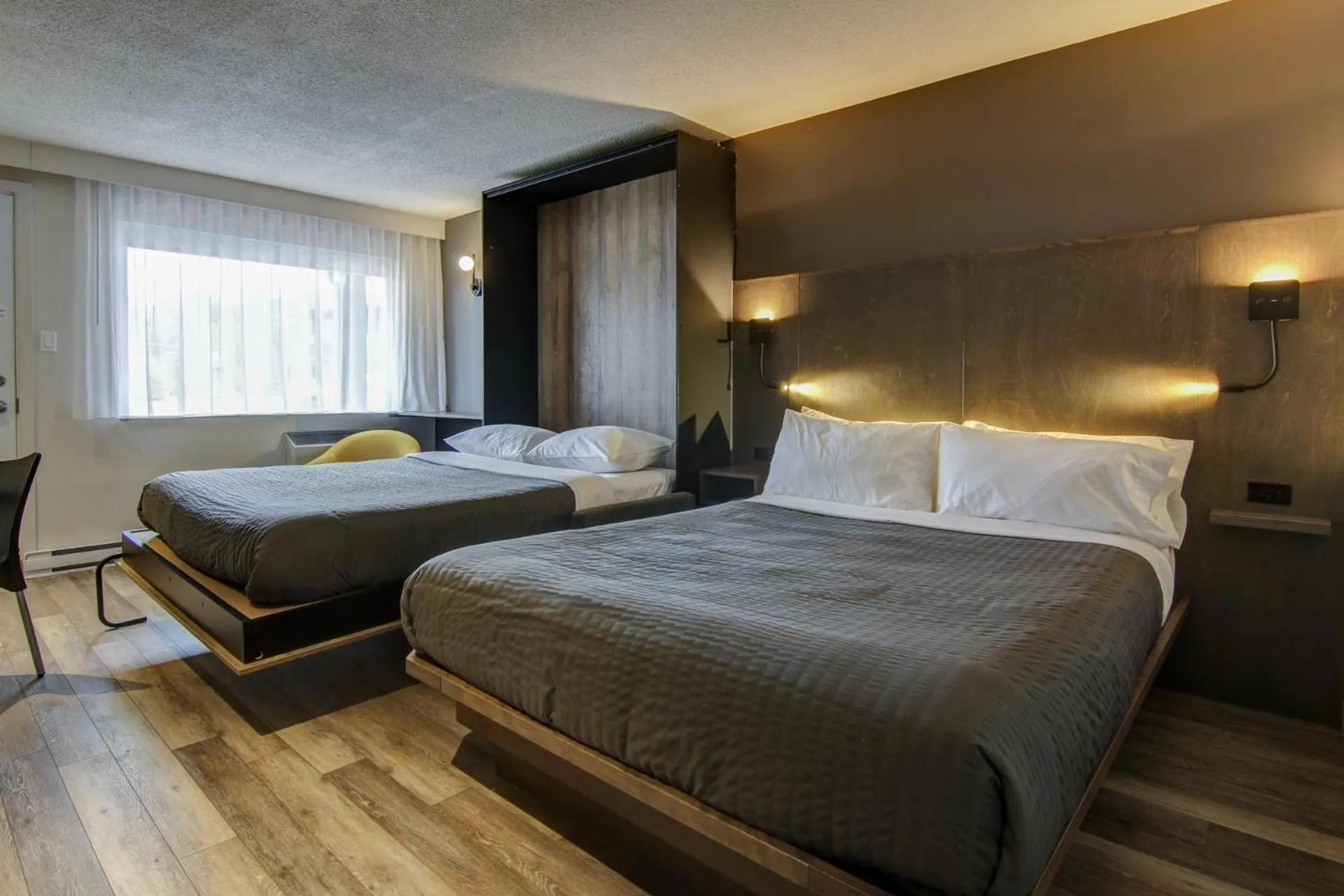 Bed in Hôtel-Motel Normandin Alma