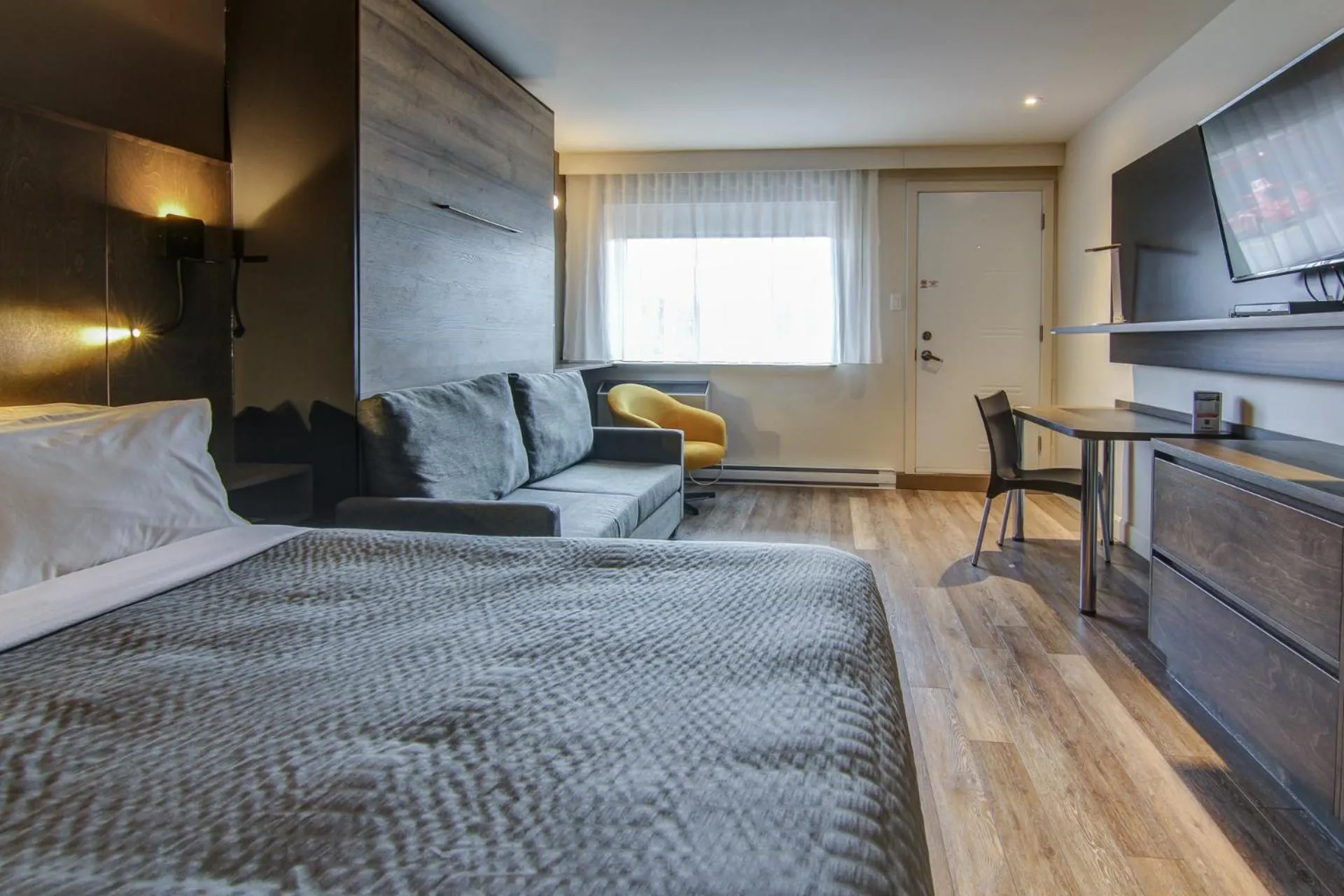 Bed in Hôtel-Motel Normandin Alma